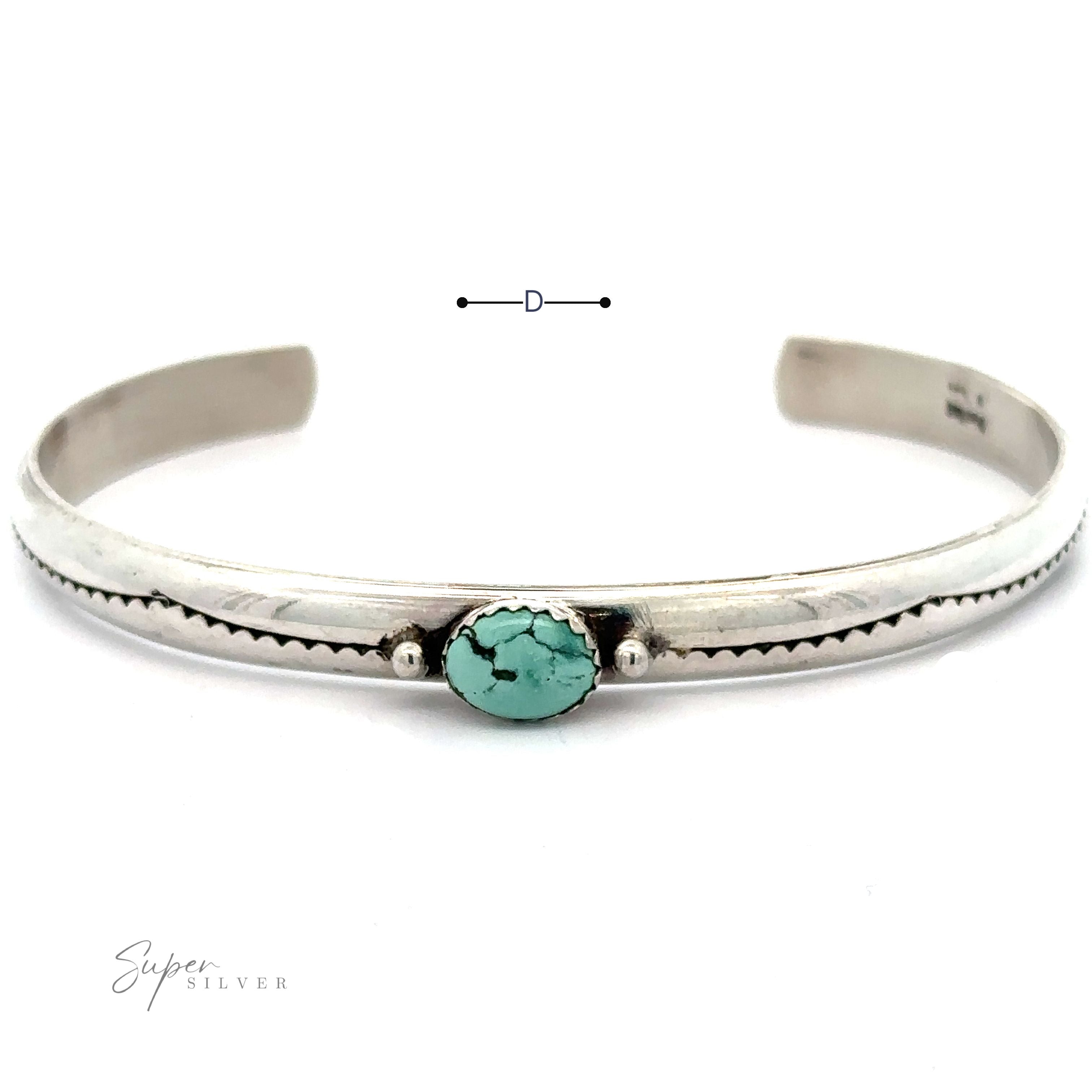 A Striking Native American Turquoise Cuff with Diamond Etching. The .925 Sterling Silver handcrafted Navajo cuff has a simple design, including a measurement marker indicating its diameter. The brand name "Super Silver" is visible in the bottom left.