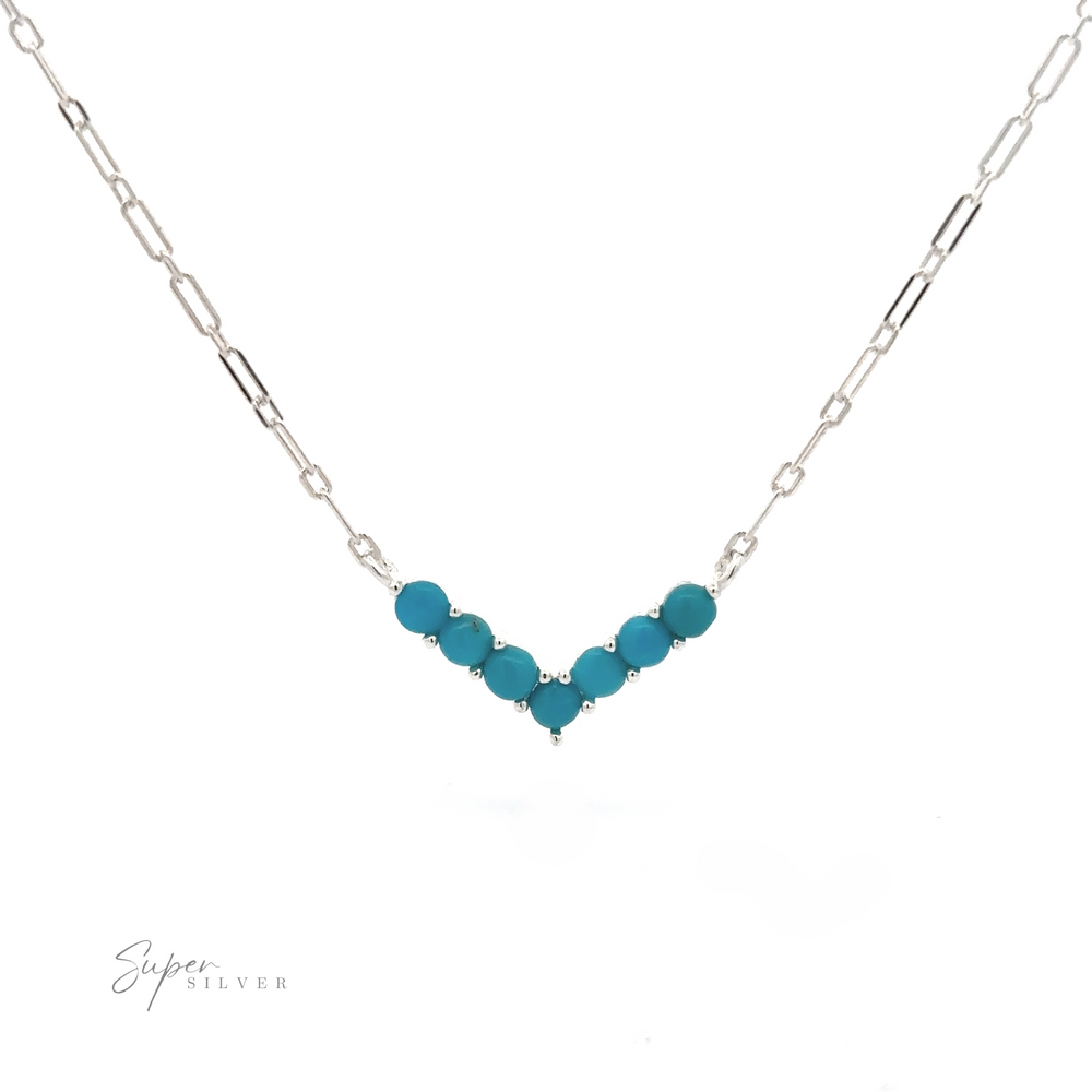 Dainty V-Shaped American Turquoise Necklace with a turquoise beaded adjustable V-shaped pendant, displayed against a white background.
