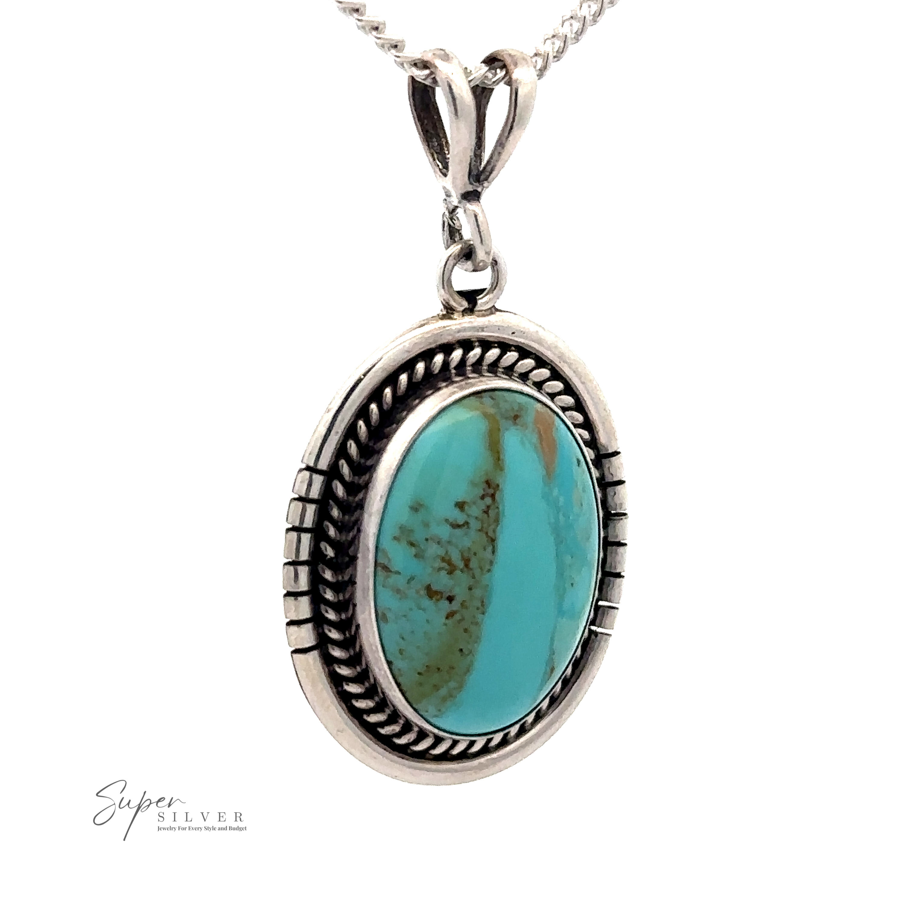 A stunning Native American Turquoise Oval Pendant featuring a large, oval turquoise stone set in an ornate bezel setting, hanging from a silver chain. The turquoise pendant showcases intricate detailing reminiscent of Native American craftsmanship.