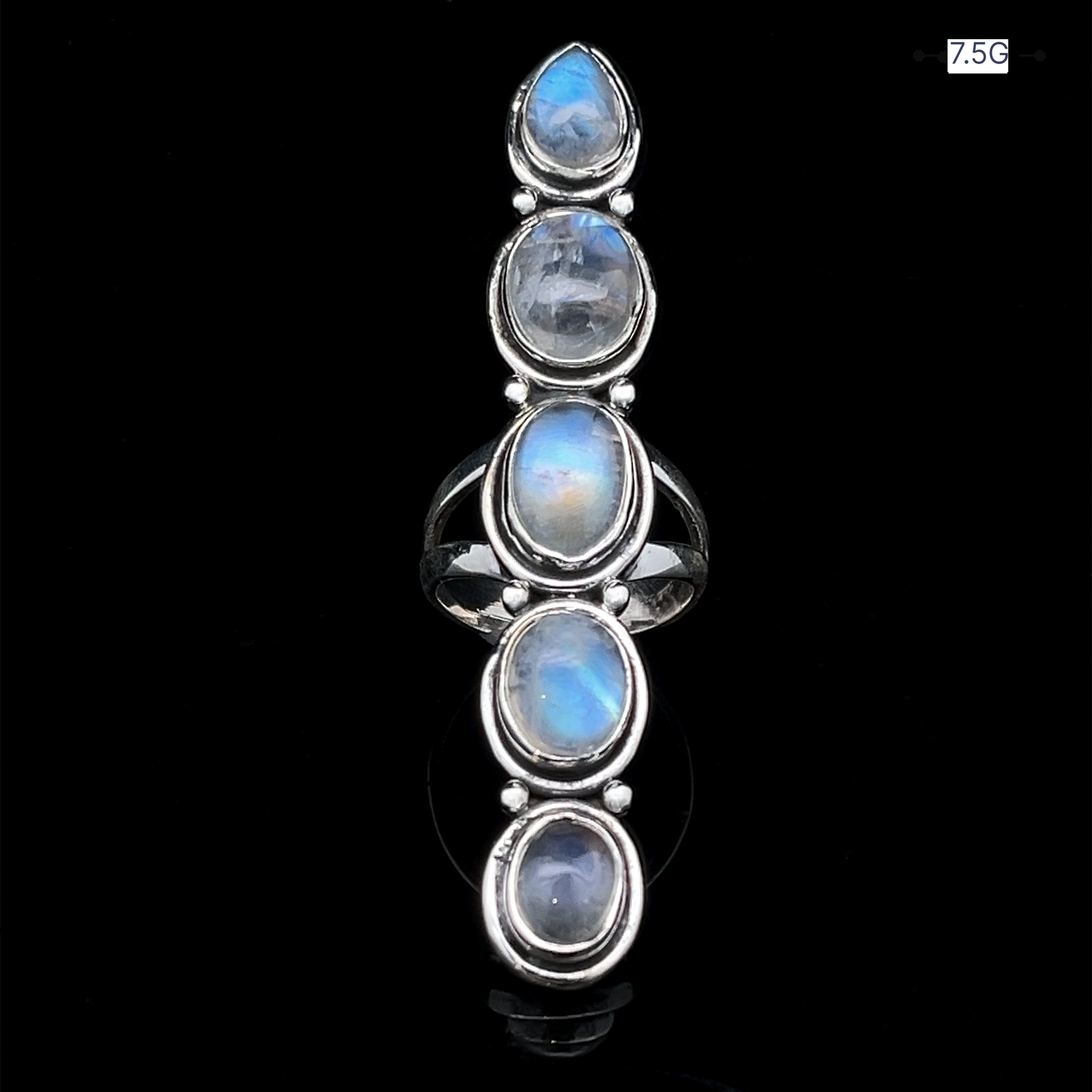 The Moonstone Ladder Ring is a sterling silver Bohemian piece with five oval moonstone cabochons set vertically against a black background. A corner label displays "7.5G.