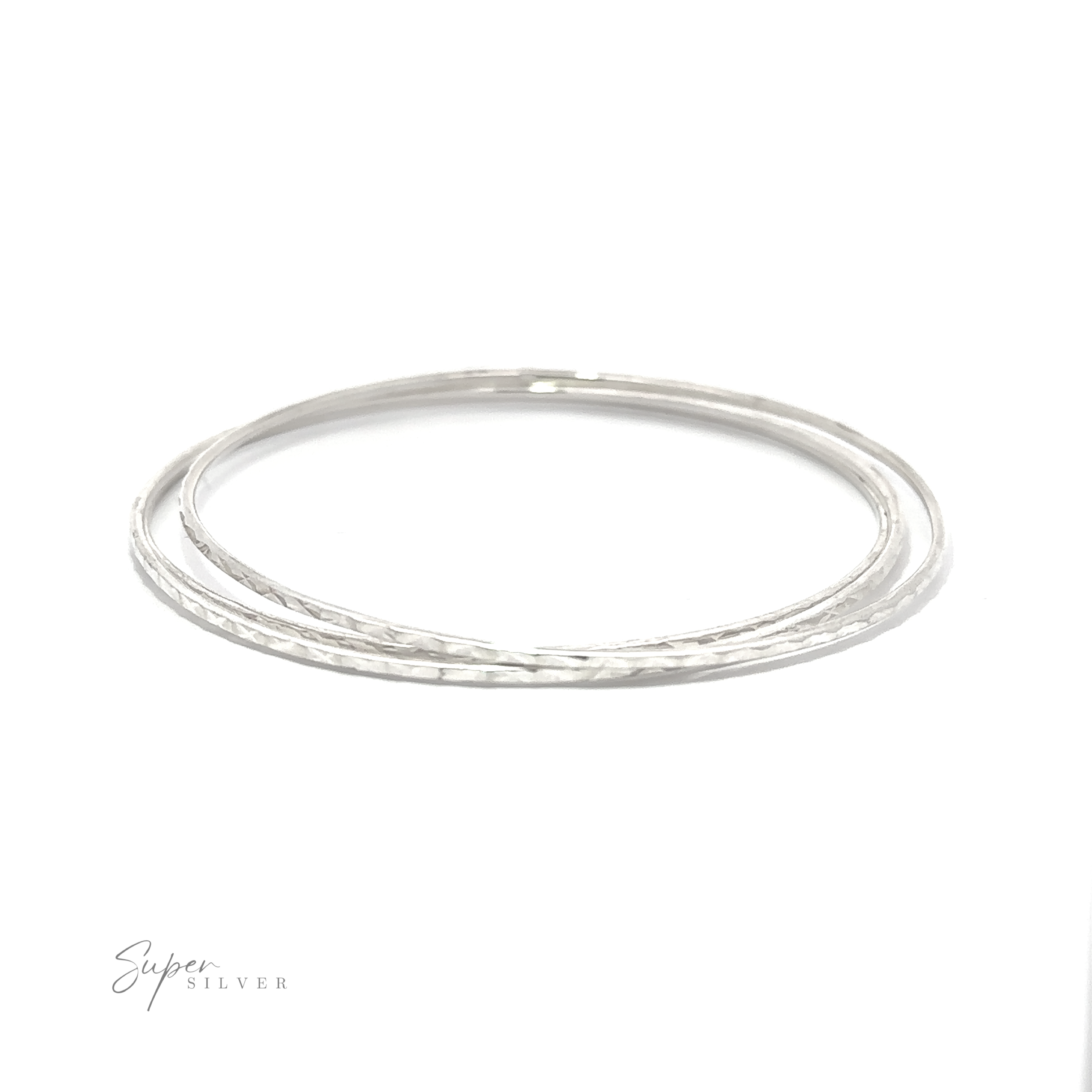 A pair of Sparkling Faceted Bangle Bracelets against a minimal white background.