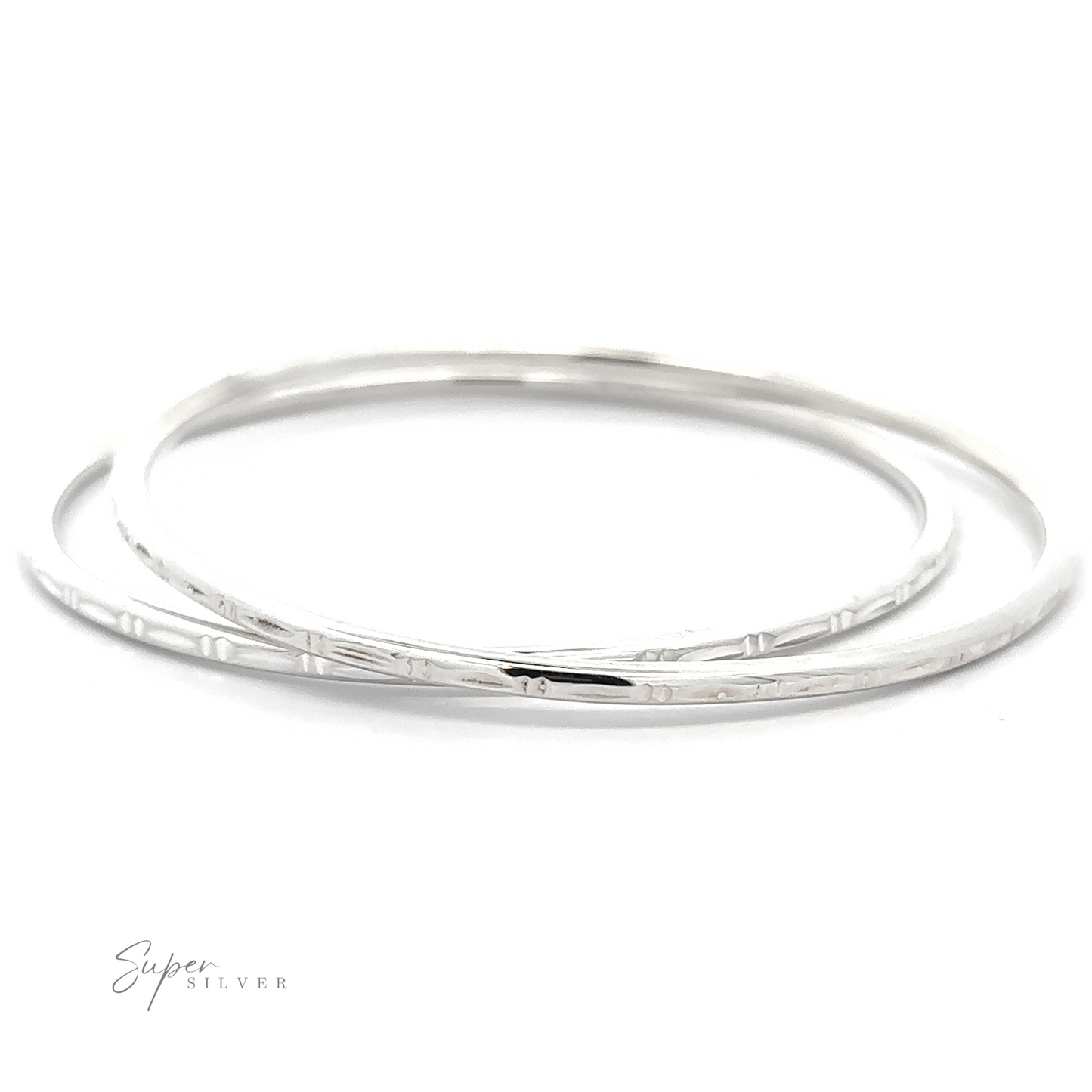 Two Silver Bangle Bracelets with Faceted Cut on a white background with a bamboo facet cut design.