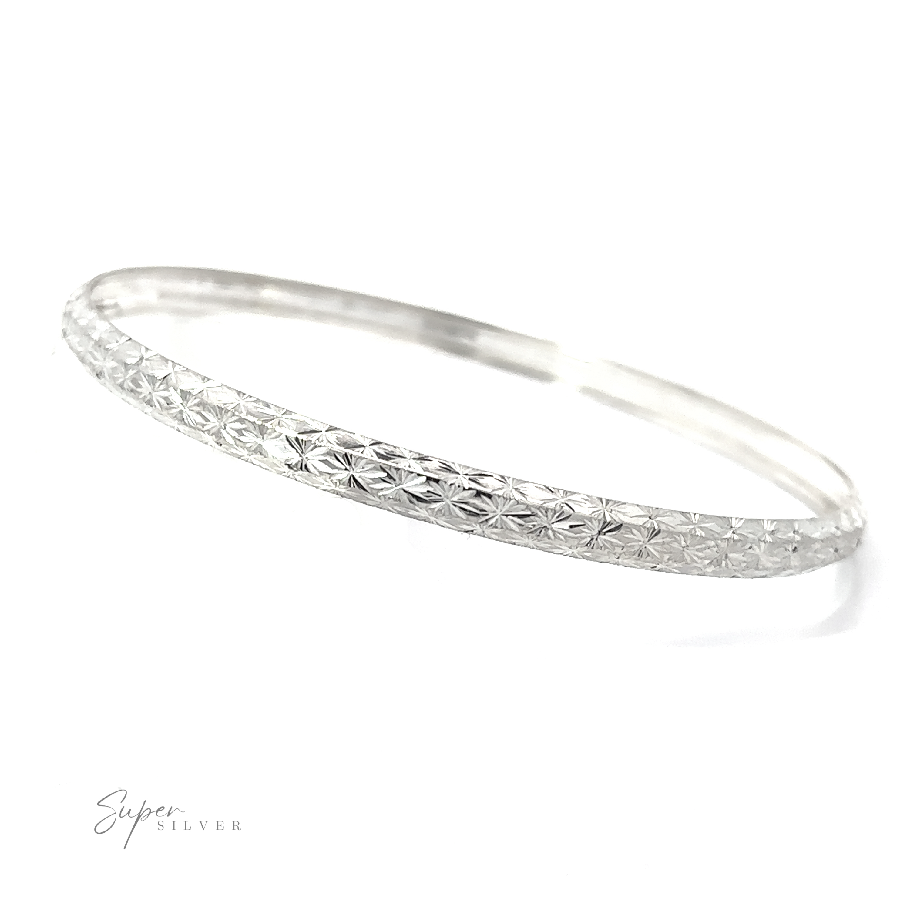 A stunning Elegant Etched Bangle Bracelet with a textured pattern that sparkles in the light, a truly unique find.