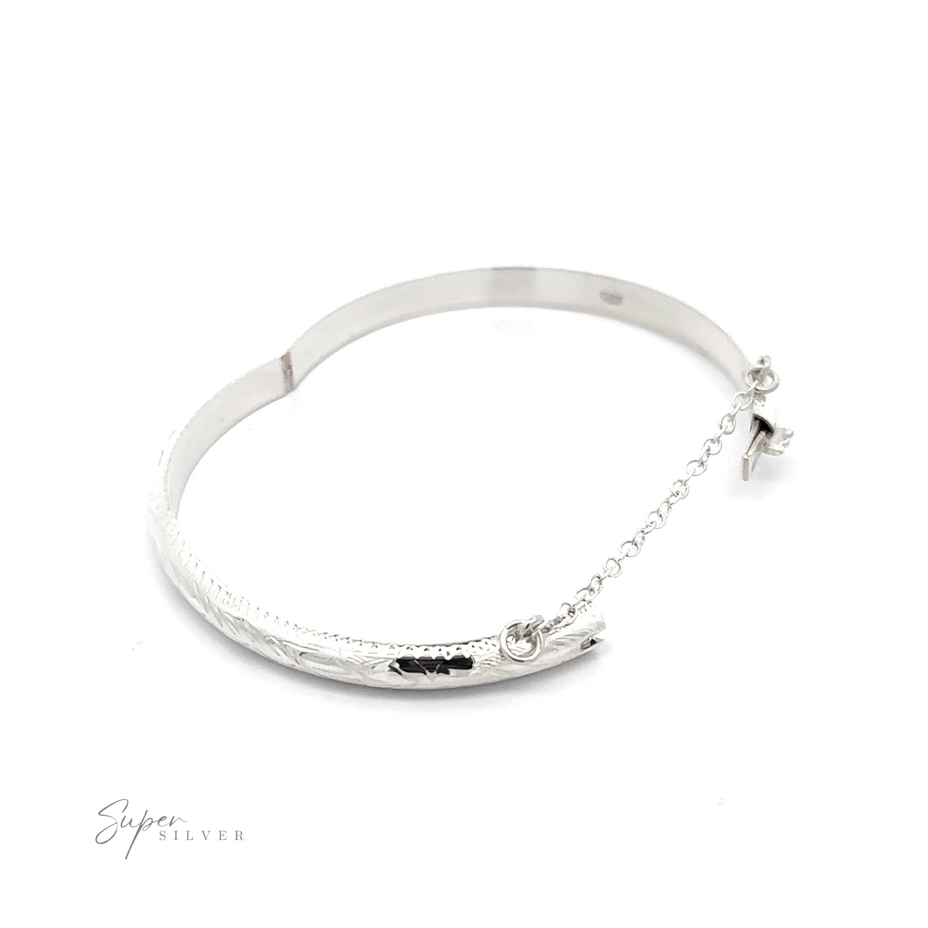 A Small Etched Latching Bangle with a textured surface, featuring a safety chain and hook clasp. The words "Super Silver" are etched in the bottom left corner, highlighting its .925 Sterling Silver quality.