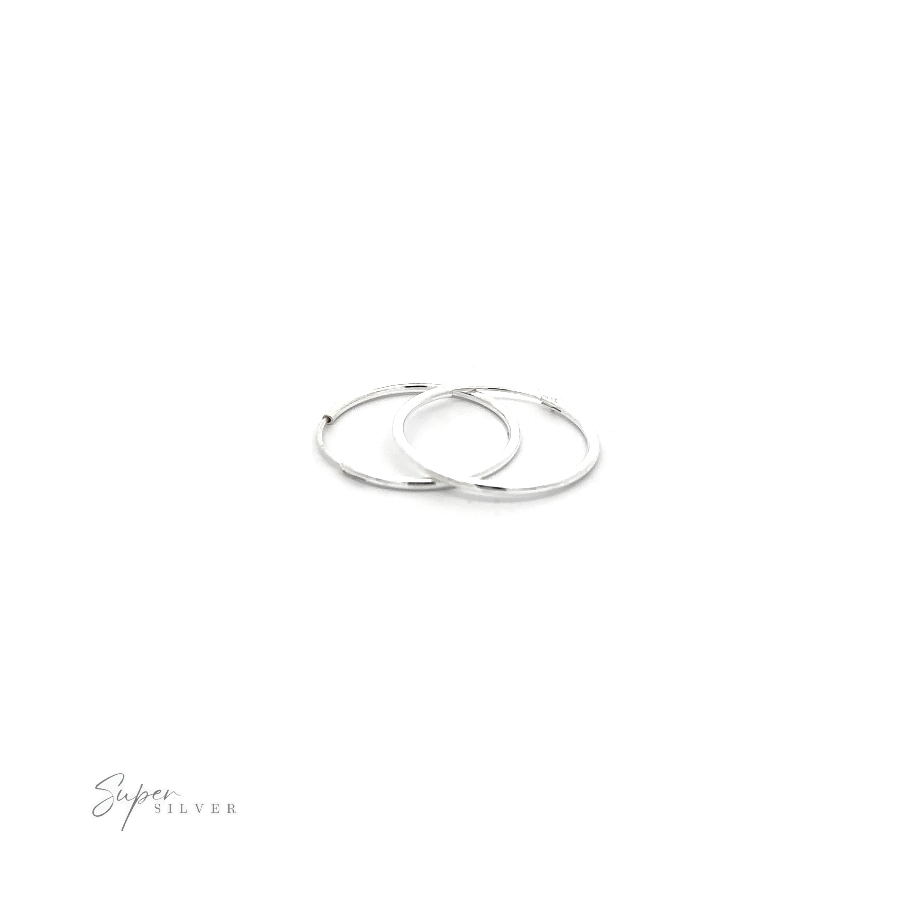 Two 1.5mm Infinity Hoops with minimalist flair on a white background.