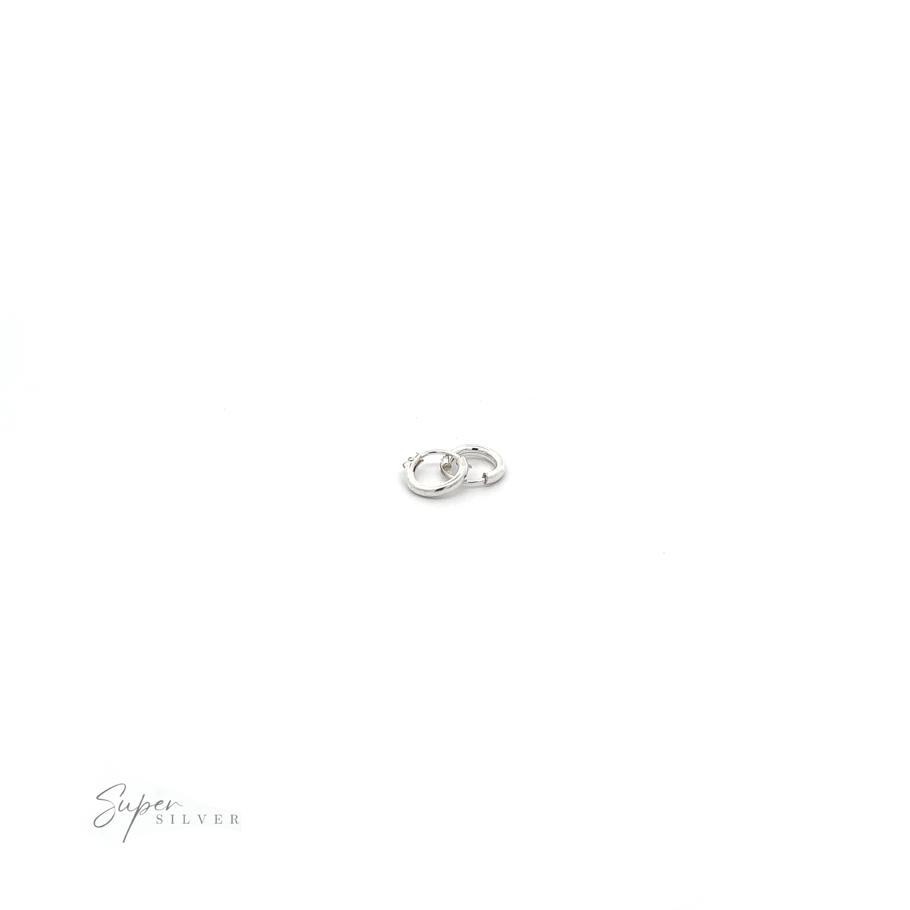 A pair of 1.5mm Infinity Hoops on a white background, adding versatile flair to any outfit.