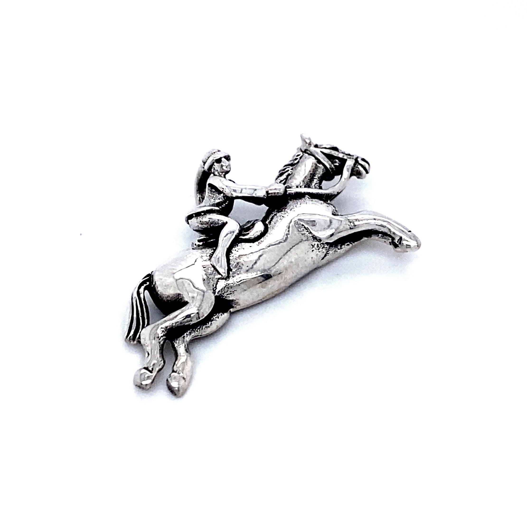 A Jumping Horse with Jockey Charm depicting a horse and rider in mid-jump against a plain white background, making the perfect equestrian gift.