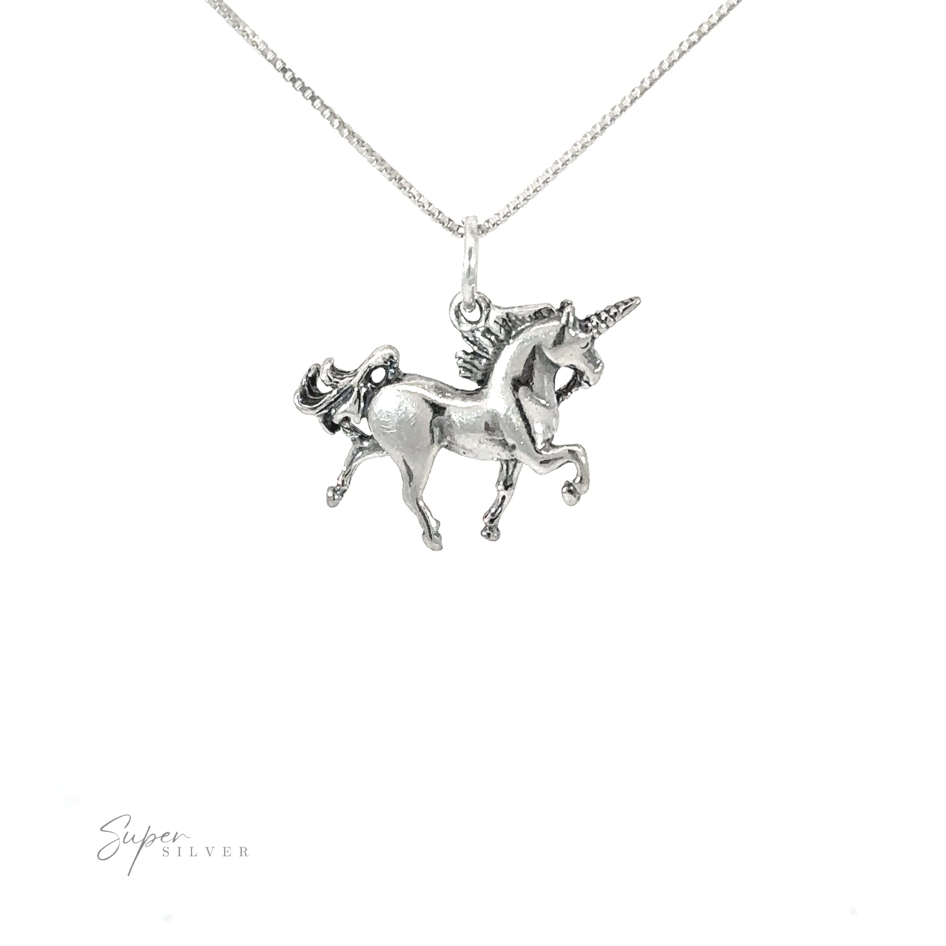 A .925 sterling silver Reversible Unicorn Charm pendant on a chain, set on a white background.