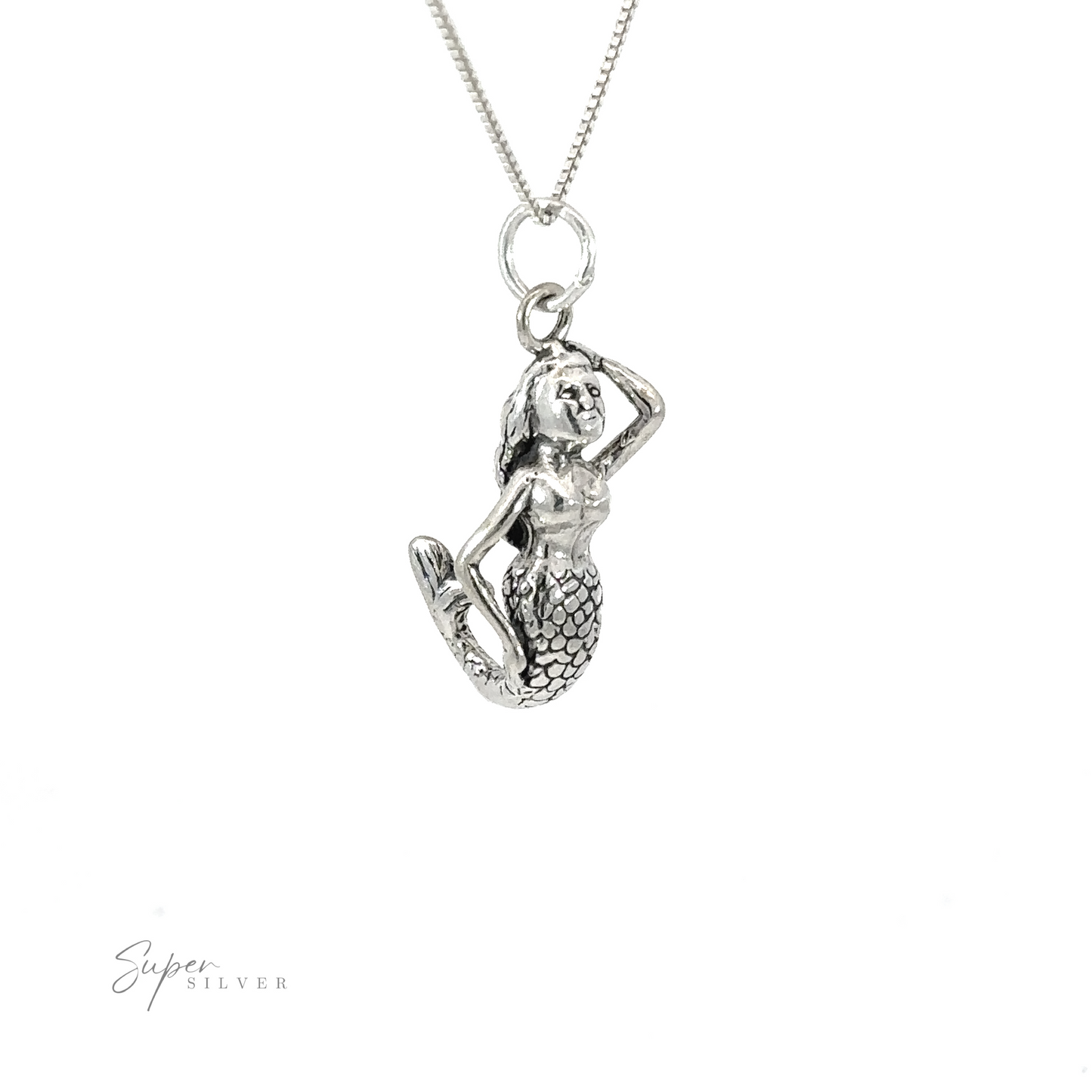 
                  
                    A silver necklace with a Small Mermaid Charm.
                  
                