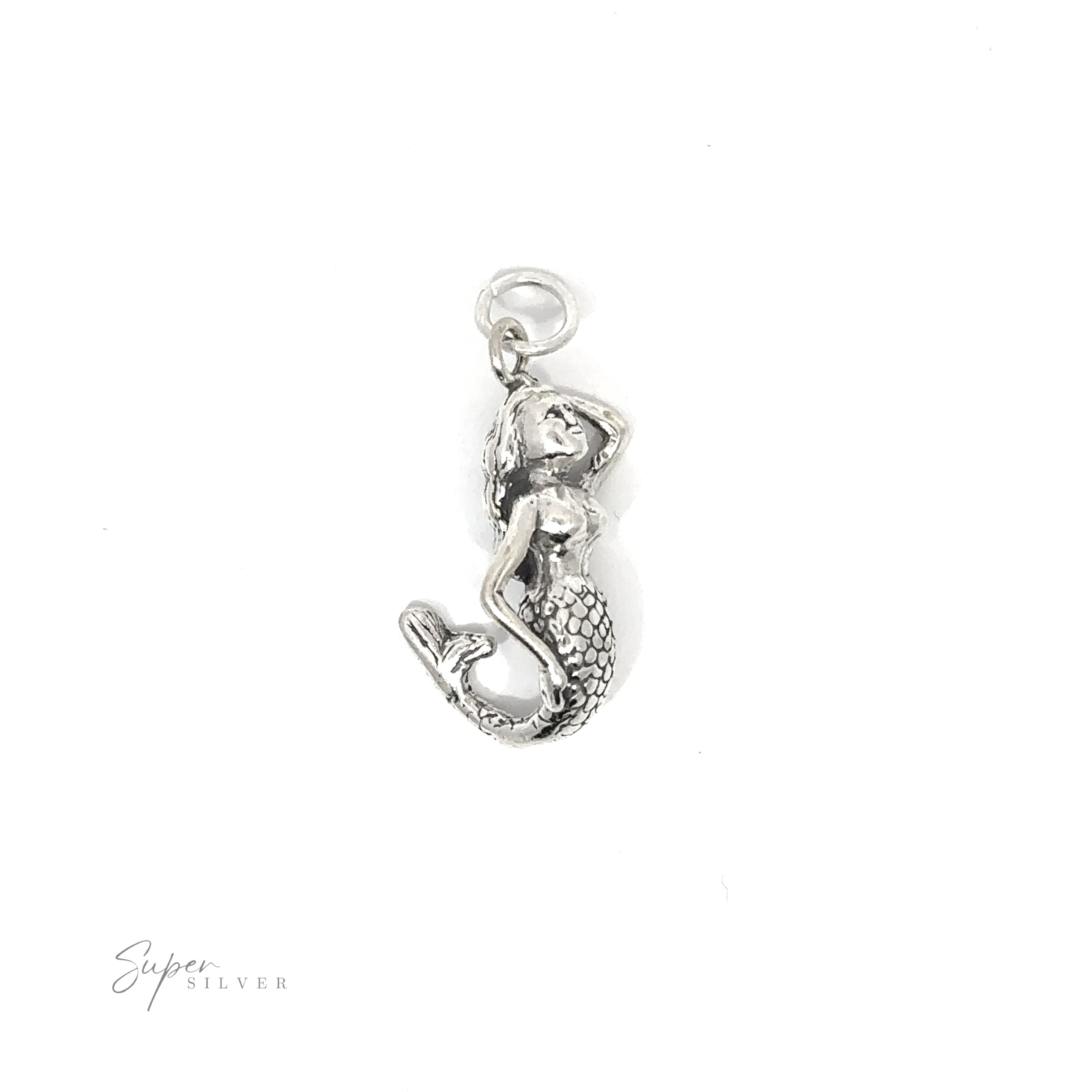 An enchanting Small Mermaid Charm, evoking the mysterious beauty of the ocean's depths, displayed on a serene white background.