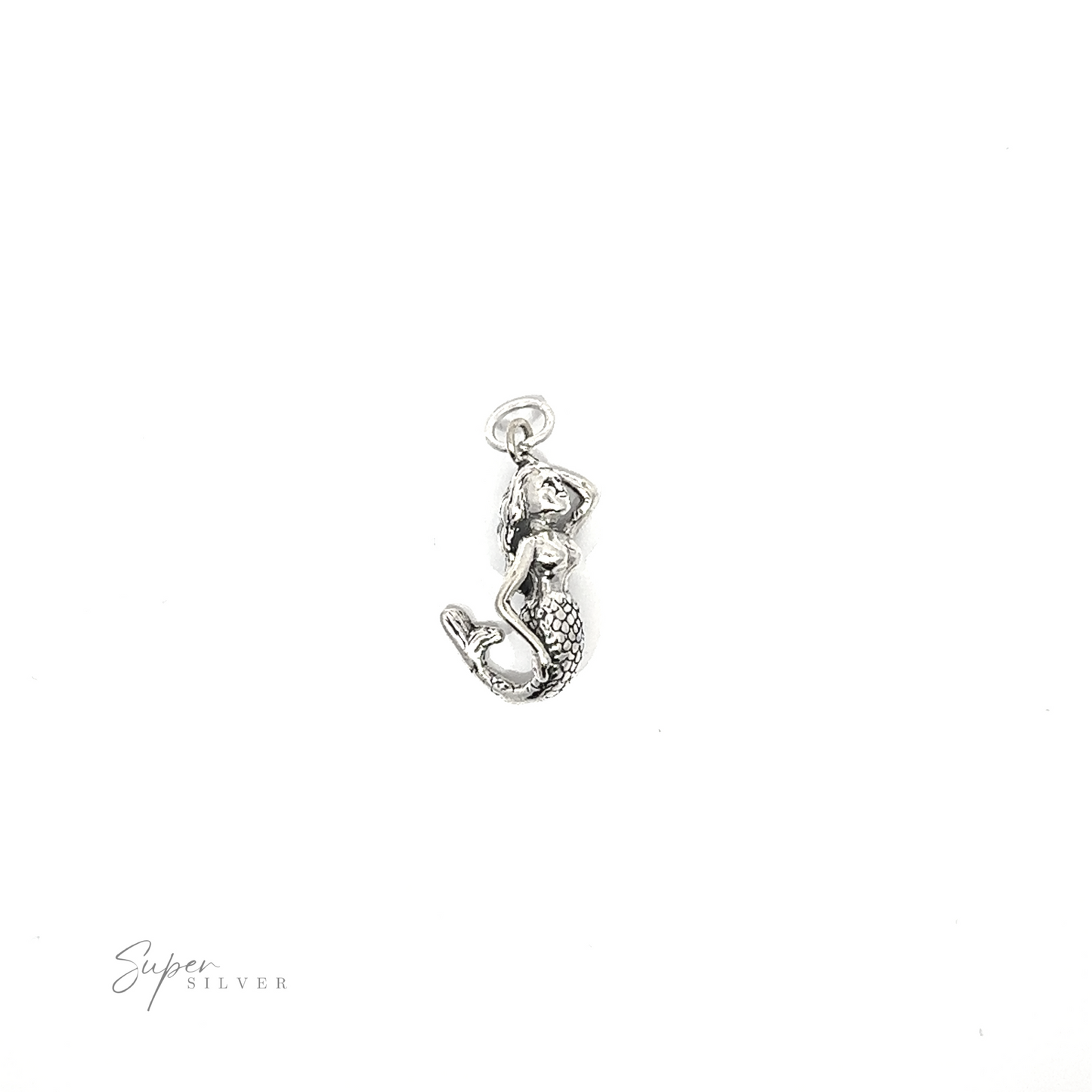 
                  
                    An enchanting small mermaid charm resting on a white background.
                  
                