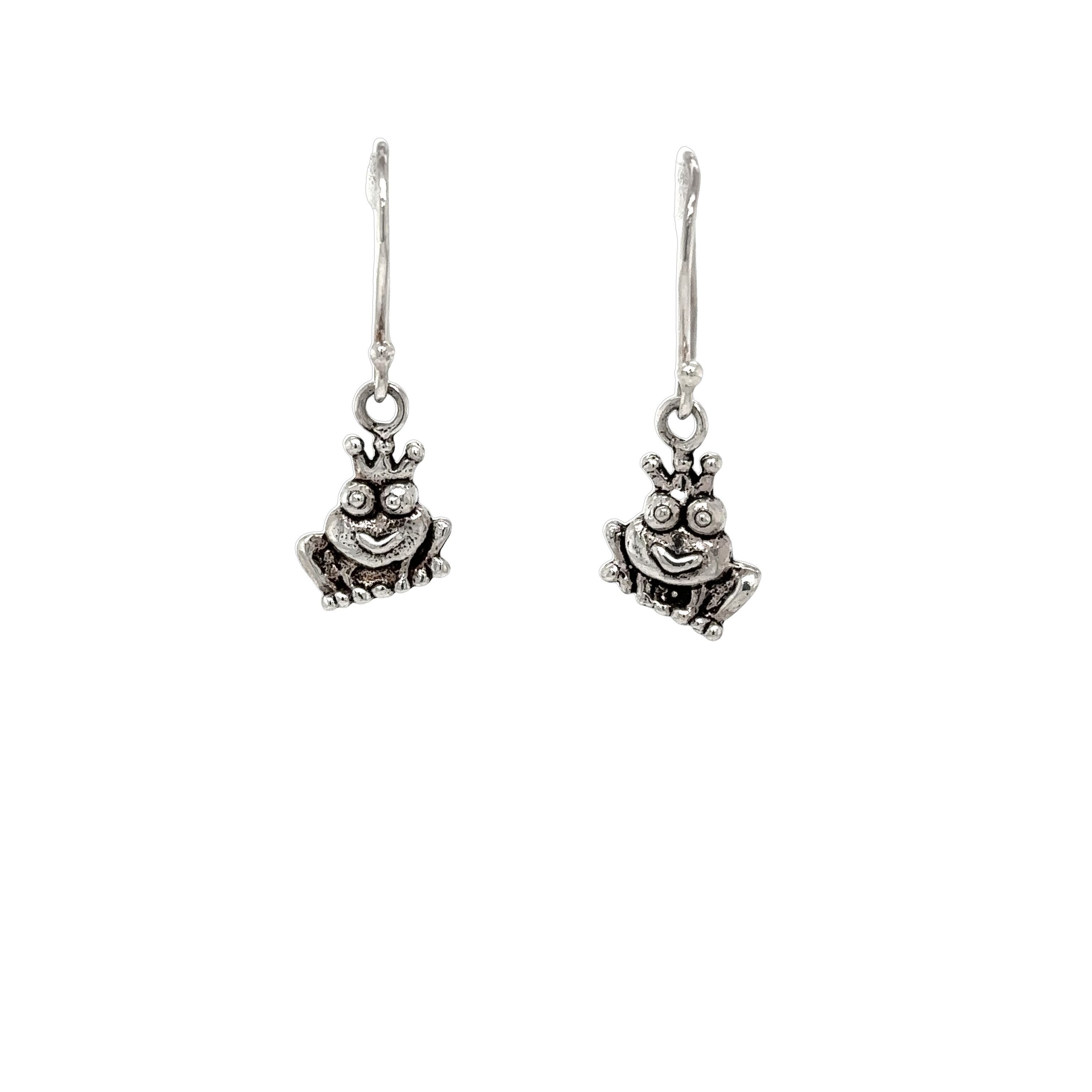 A pair of elegant Super Silver Frog Queen Earrings on a white background.
