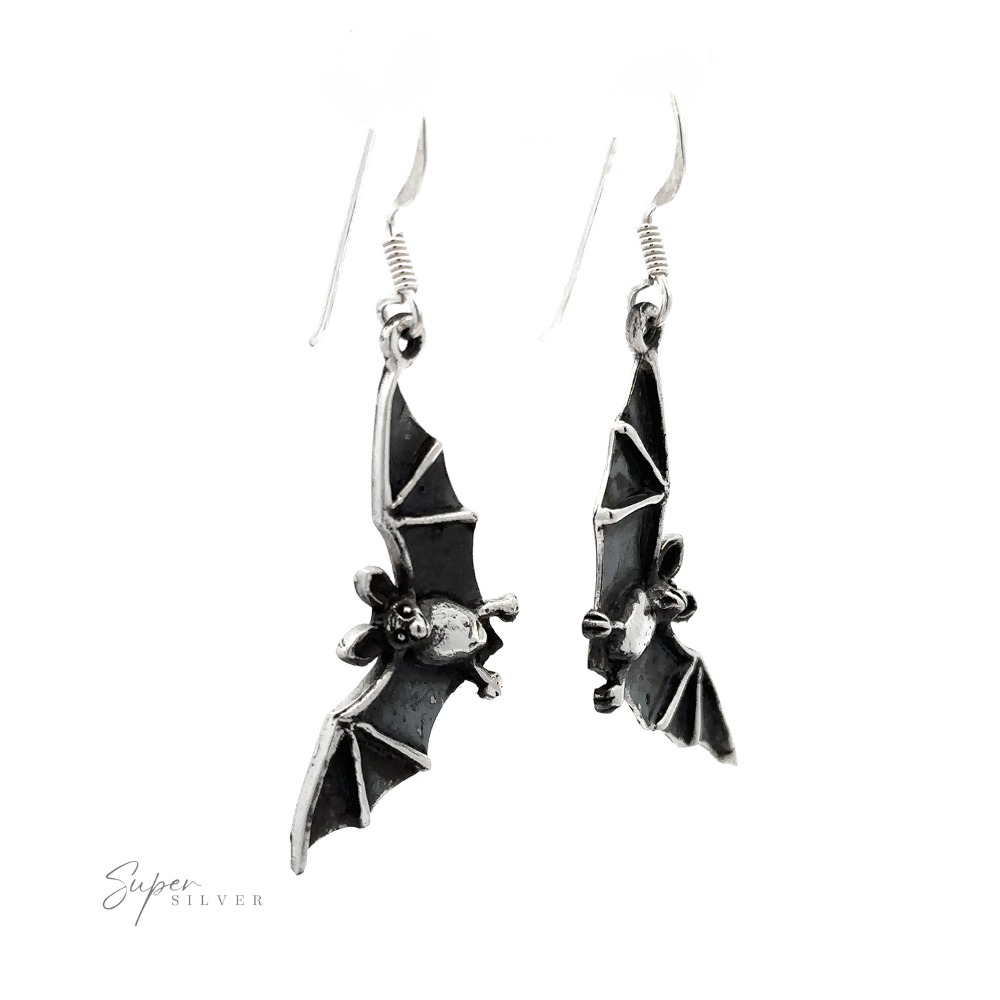 A pair of Flying Bat Earrings with small floral details at the center, hanging from hooks, against a white background.