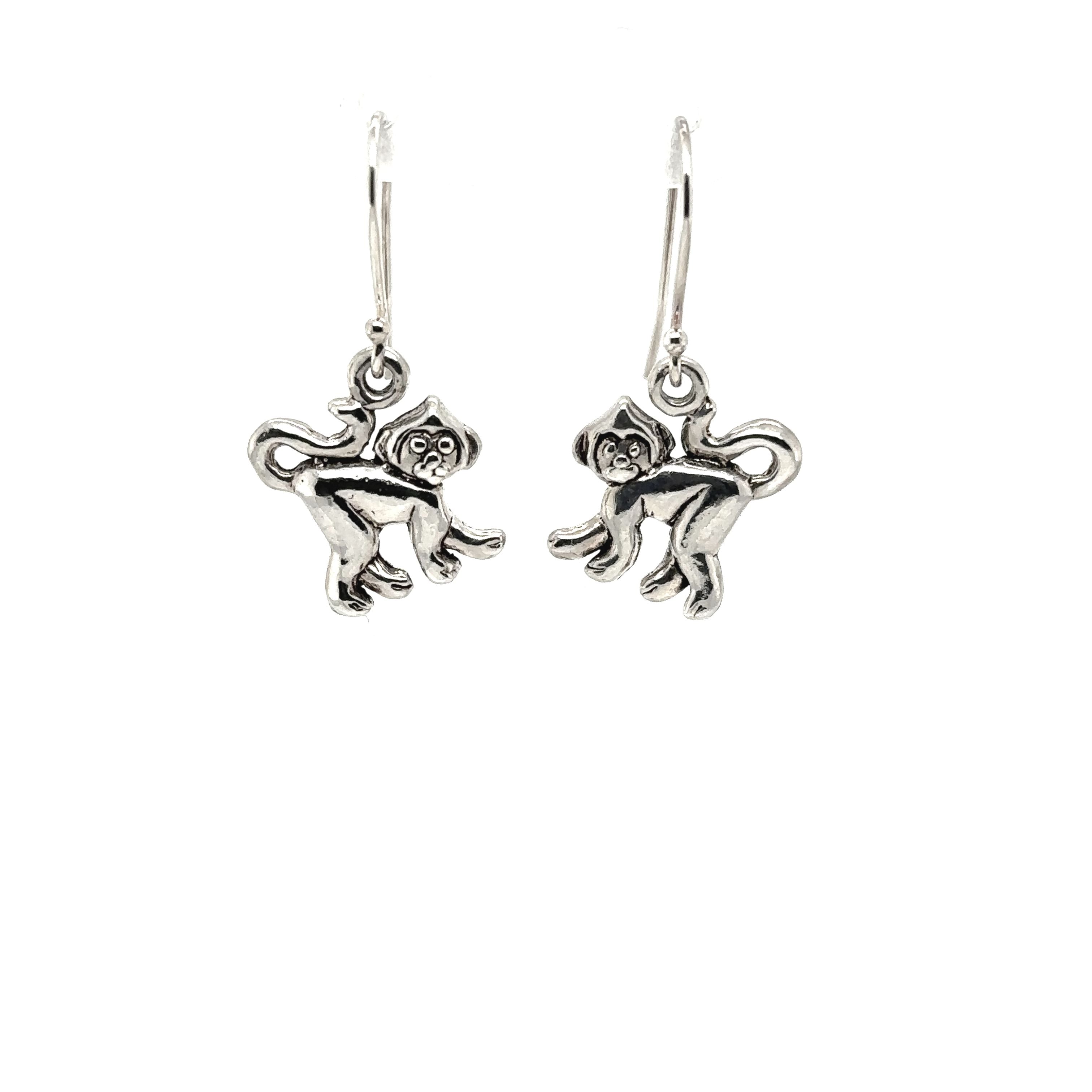 A pair of cute Super Silver monkey earrings.