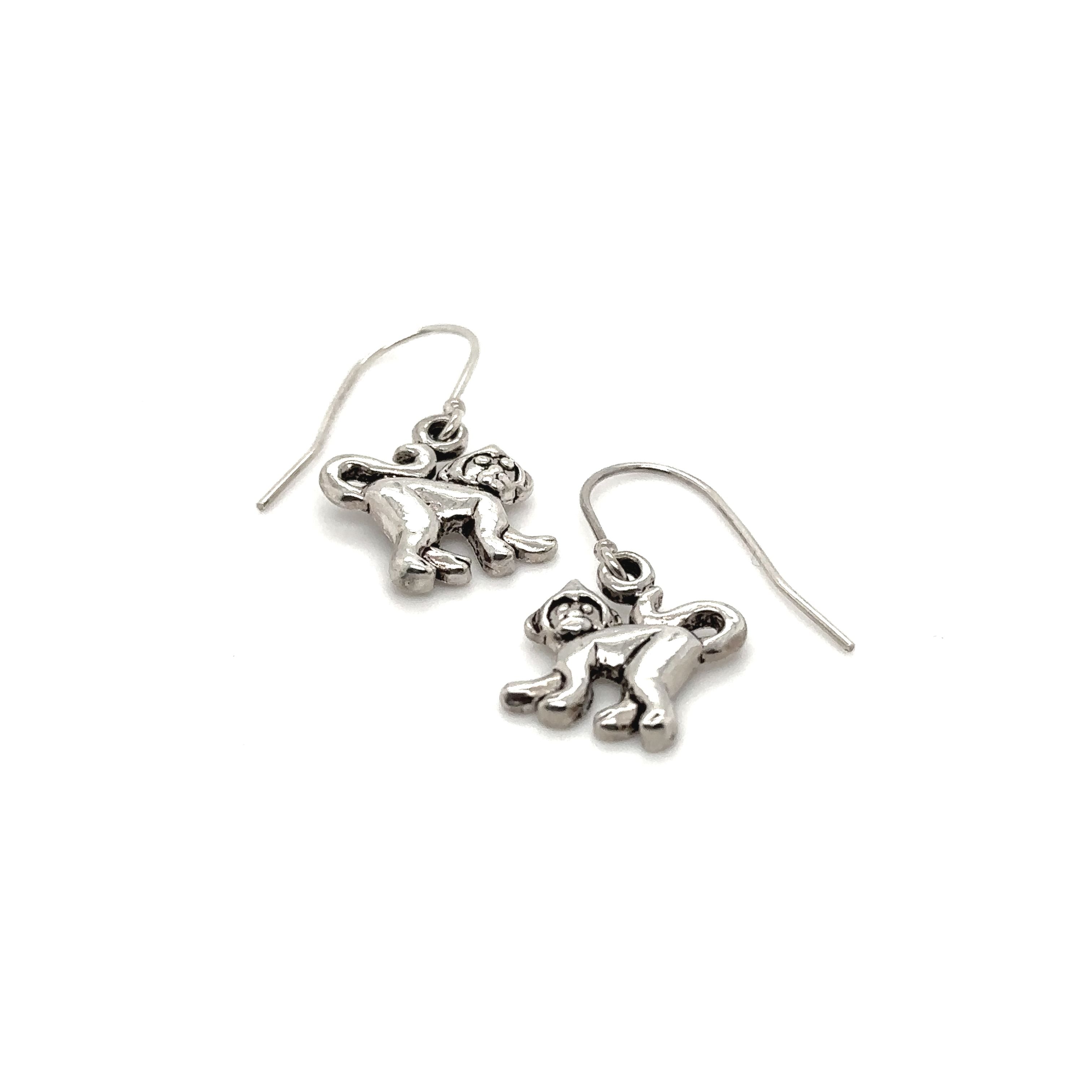 A pair of cute Super Silver Monkey Earrings.