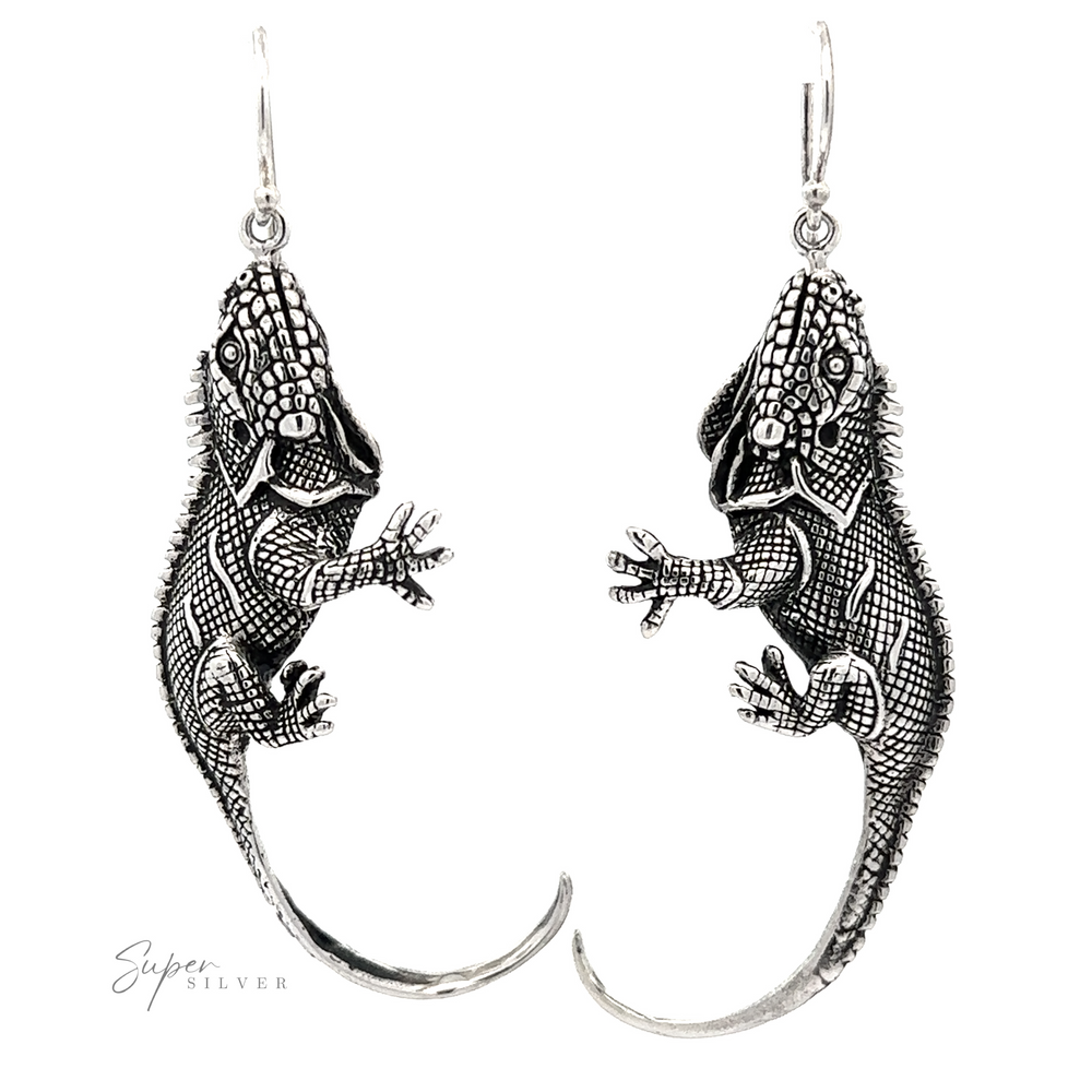 
                  
                    A pair of silver Statement Iguana Earrings from artisan collections.
                  
                