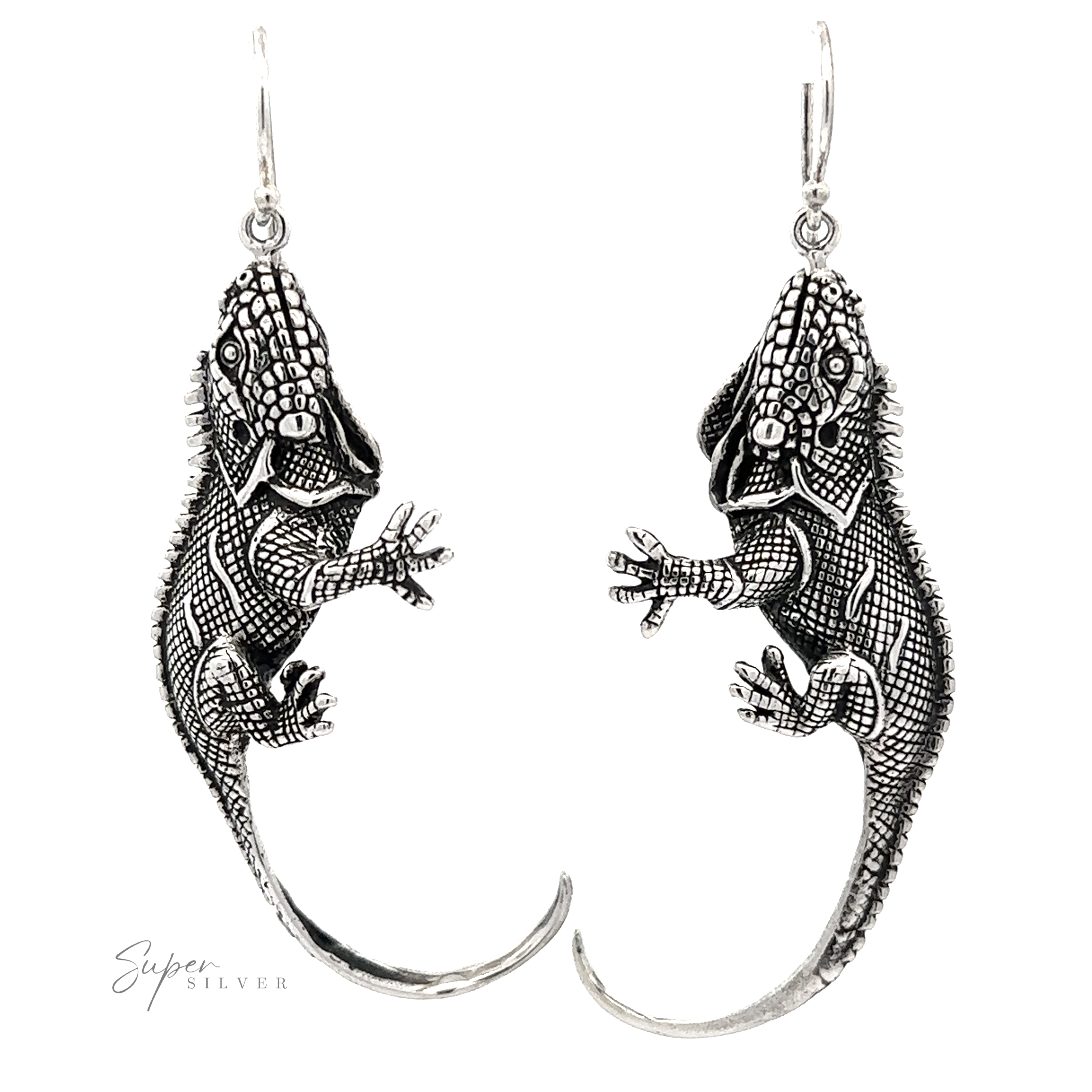 A pair of silver Statement Iguana Earrings from artisan collections.