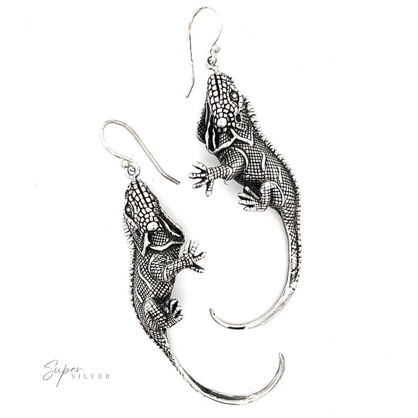 
                  
                    A pair of intricate Statement Iguana Earrings from our artisan collections.
                  
                