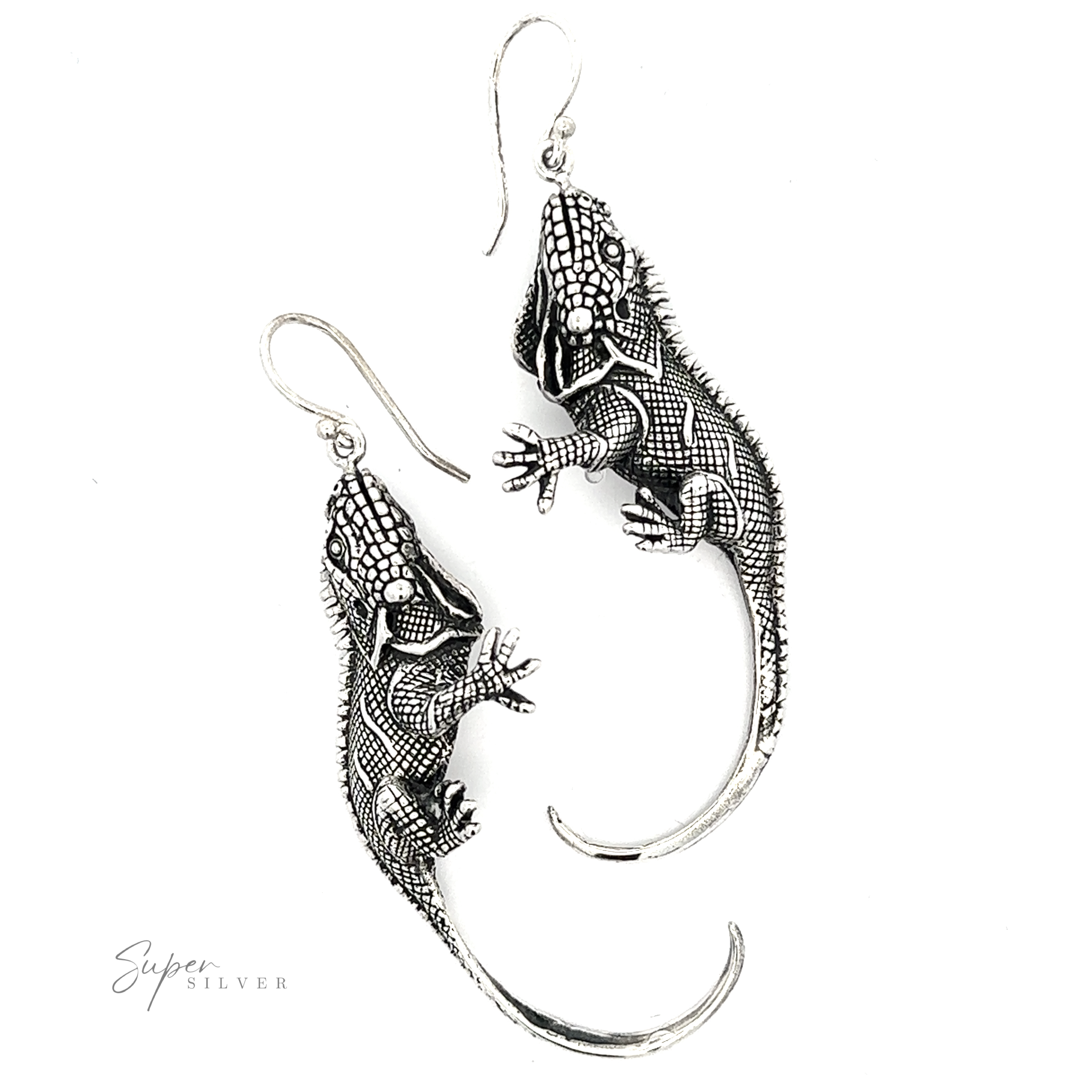 A pair of intricate Statement Iguana Earrings from our artisan collections.