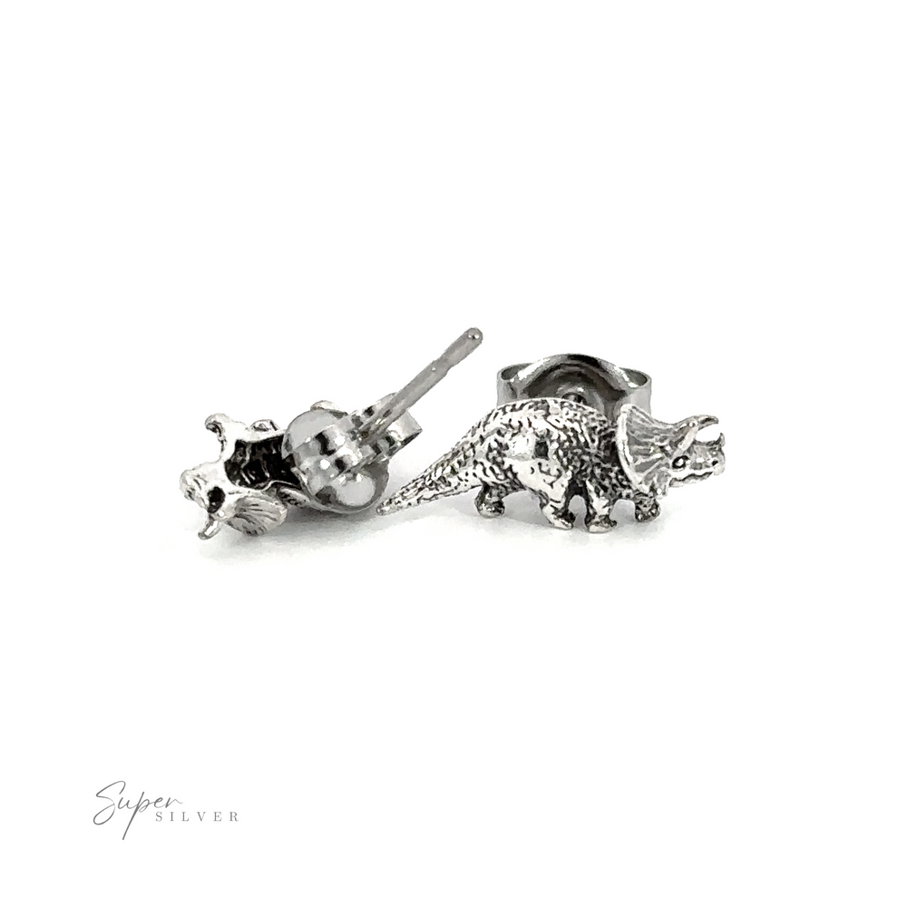 A pair of silver Triceratops Studs, a prehistoric addition for any occasion.