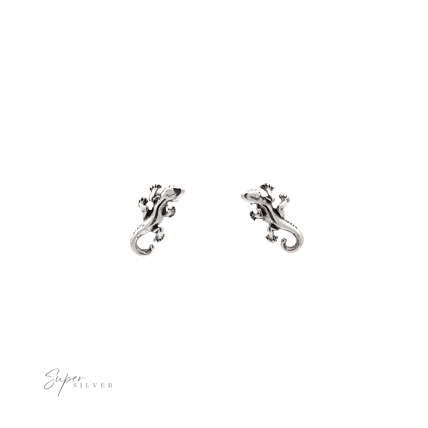 
                  
                    These Lizard Studs feature minimal detailing, crafted in silver for a stunning contrast against the white background.
                  
                