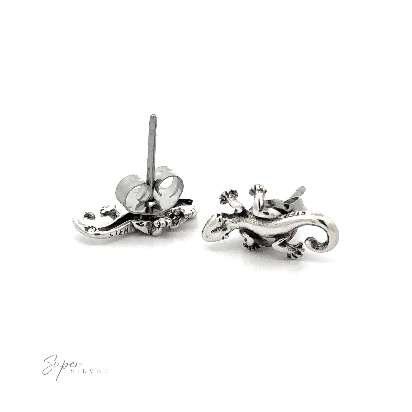 A pair of silver Lizard Studs on a white background.
