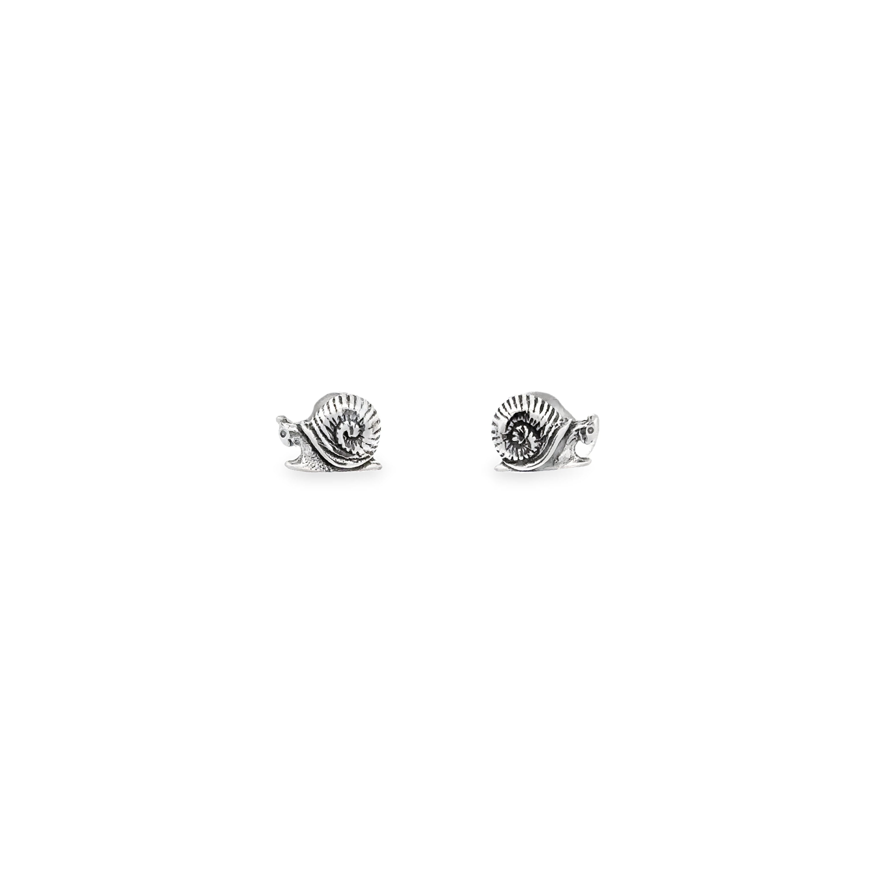 A pair of sterling silver Snail Studs with whimsical snail studs on a white background.