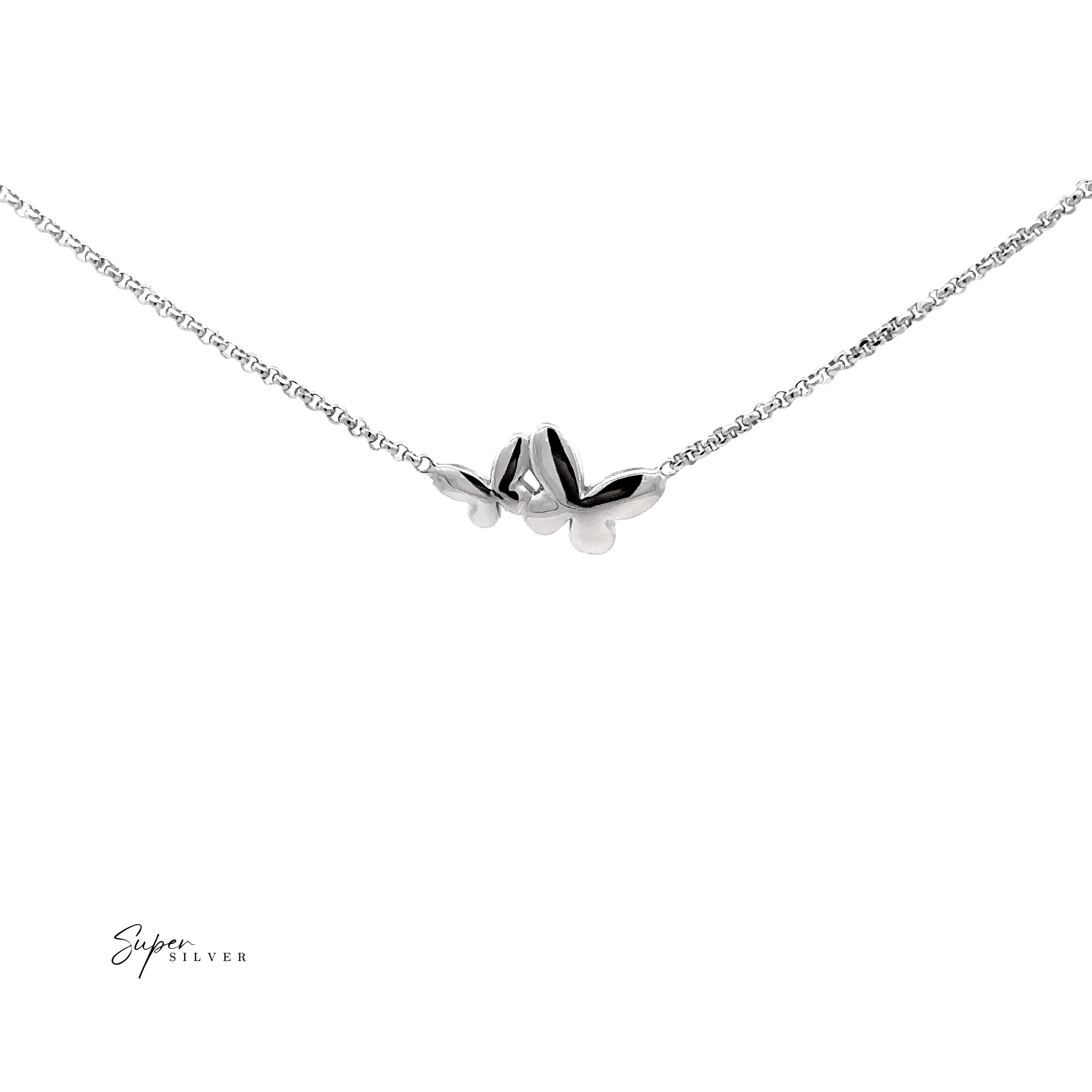 The Dainty Double Butterfly Necklace features two butterfly-shaped pendants on a delicate Italian silver chain with a radiant rhodium finish, beautifully displayed against a white background.