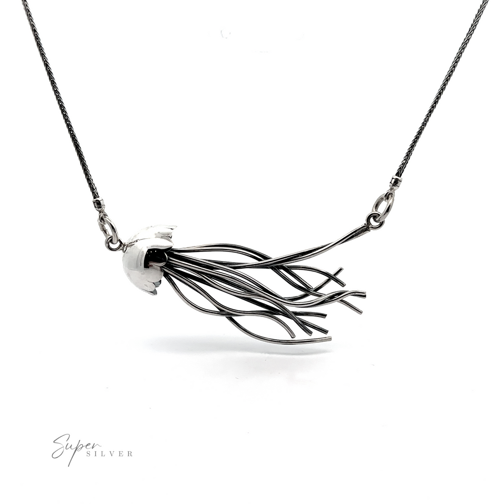 A Jellyfish Necklace featuring a pendant designed like abstract, flowing lines, displayed on a white background with the signature "super silver.