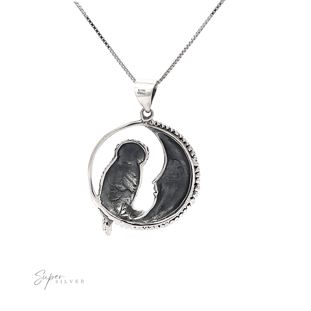 
                  
                    Owl and Moon Pendant necklace featuring a moon and a silhouetted owl perched within a circular frame, displayed against a white background.
                  
                