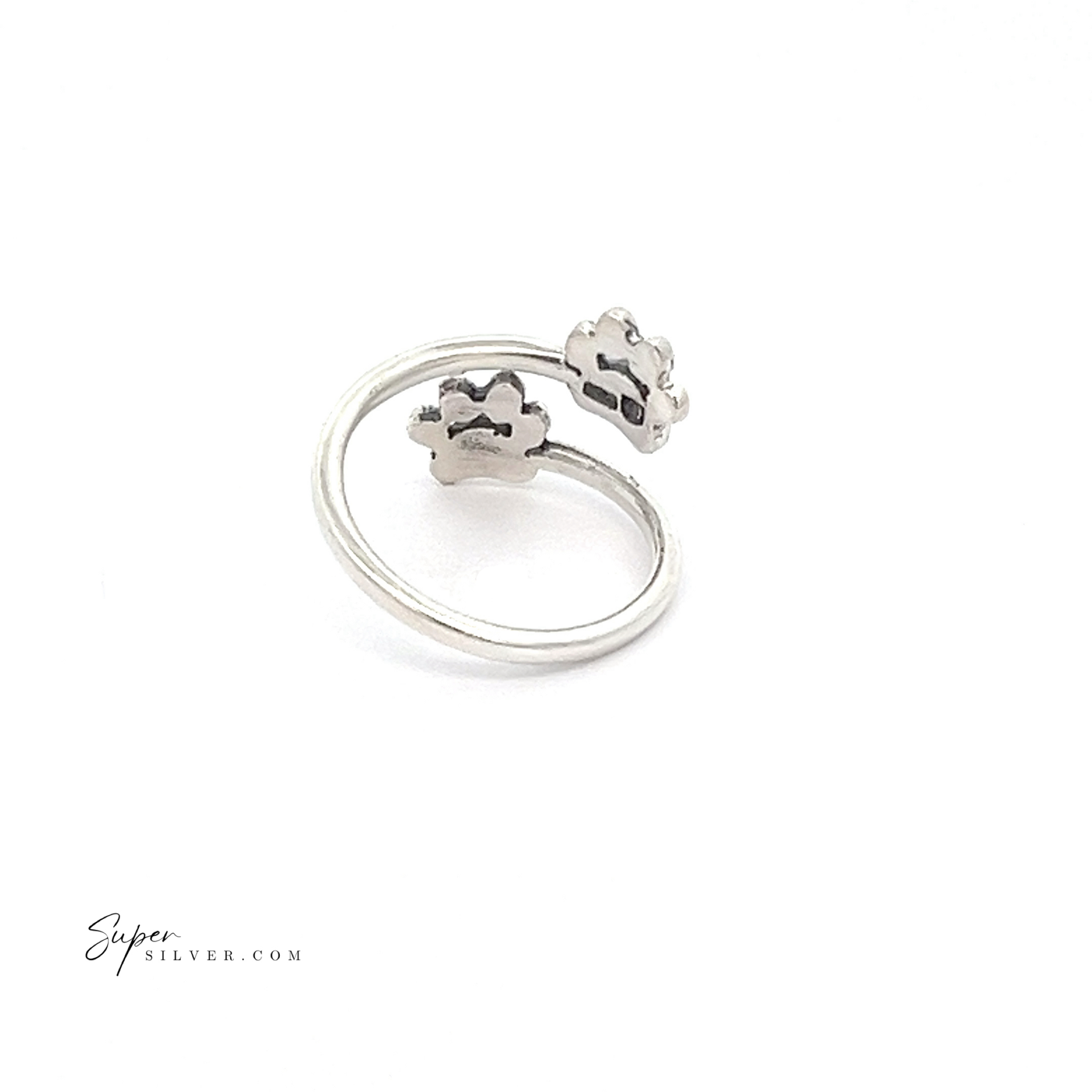 Paw Print Adjustable Ring in sterling silver features two cloud-shaped ends, making it a charming addition to any pet lover's collection, elegantly displayed on a white background.