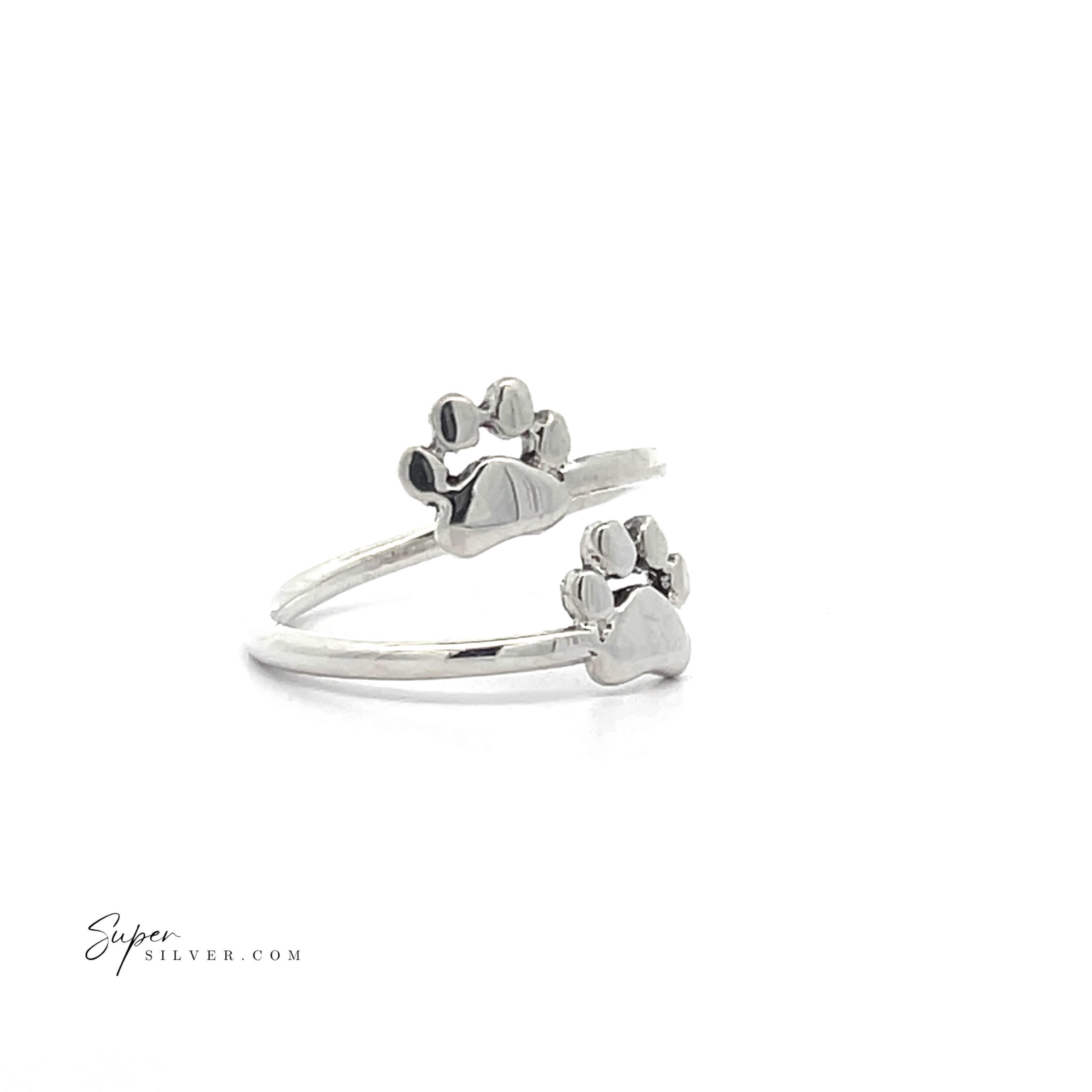 The Paw Print Adjustable Ring is crafted from sterling silver and features a delightful paw print design, making it an ideal choice for any pet lover.