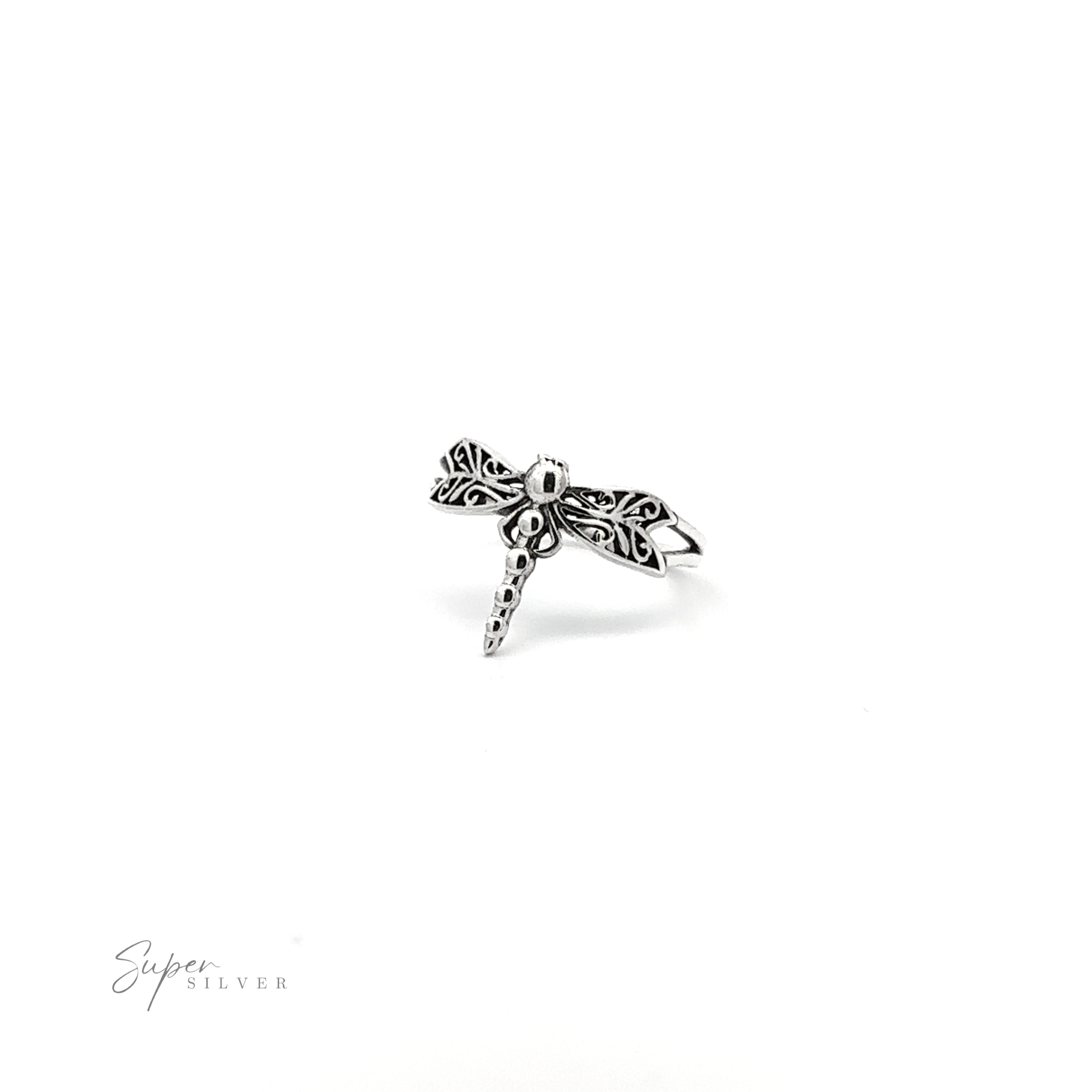A Silver Dragonfly Ring with filigree etching on a white background, perfect for nature lovers.