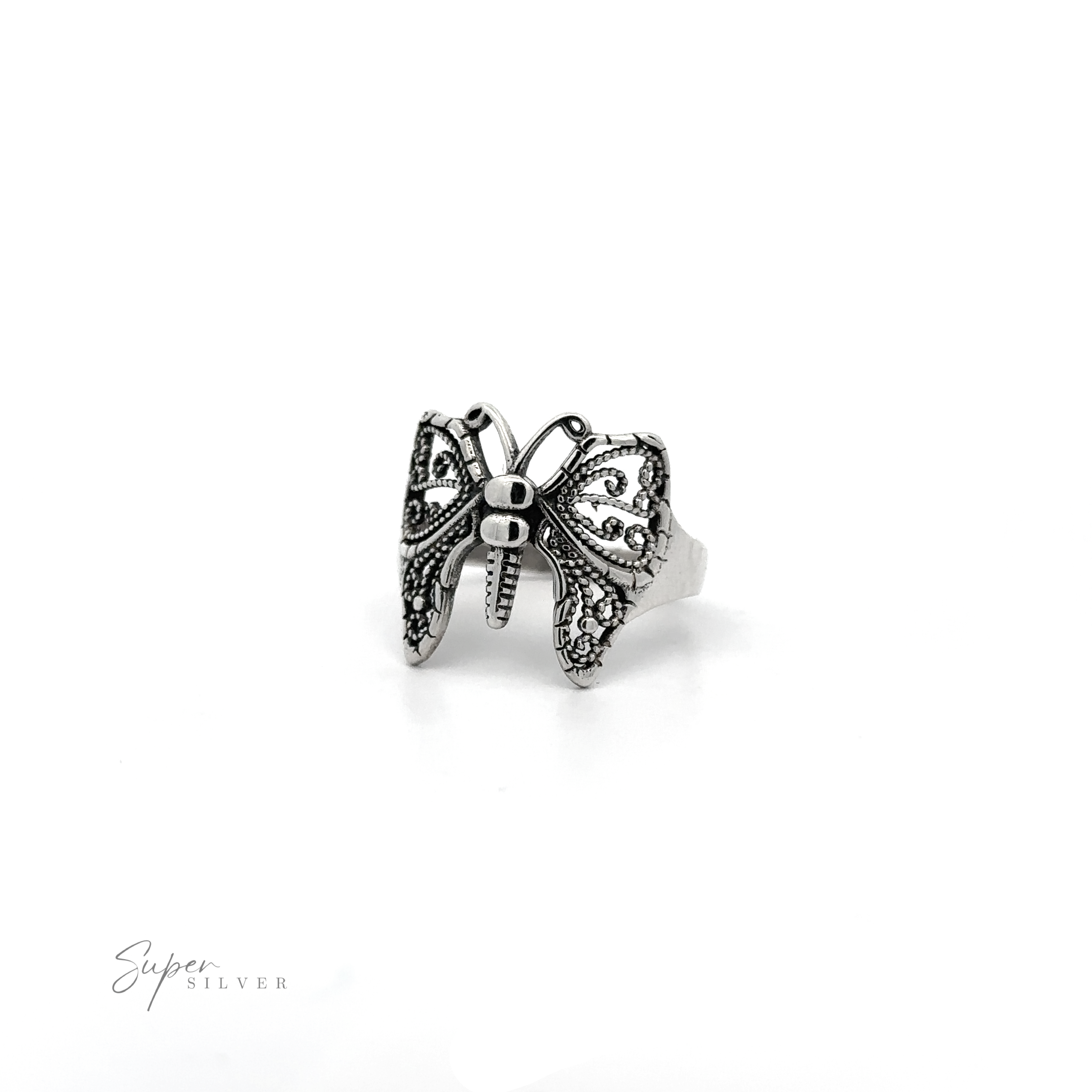 A Beautiful Butterfly Ring With A Wide Band on a white background.