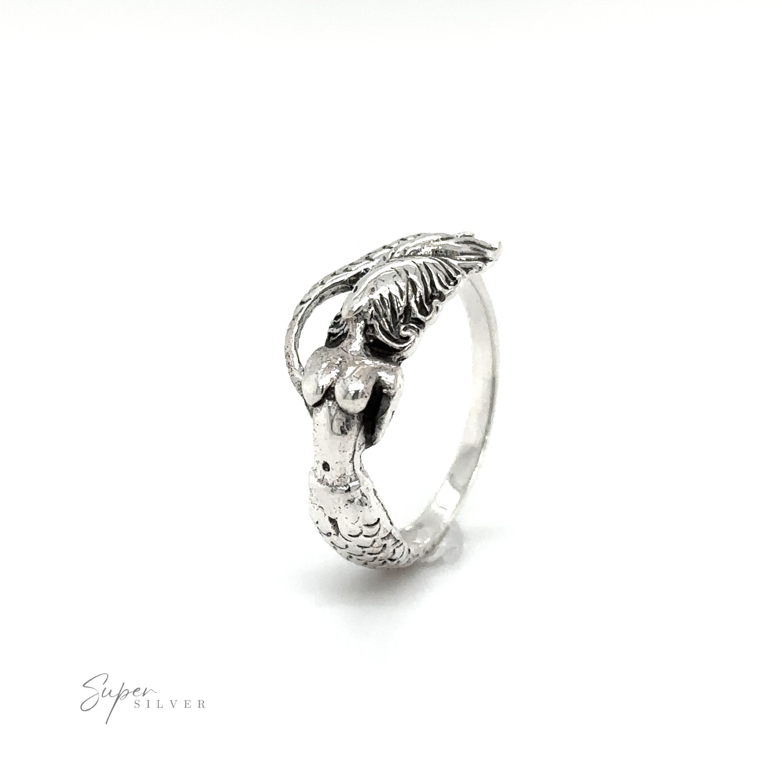 A Mermaid Ring with Swirly Tail with a bird on it.