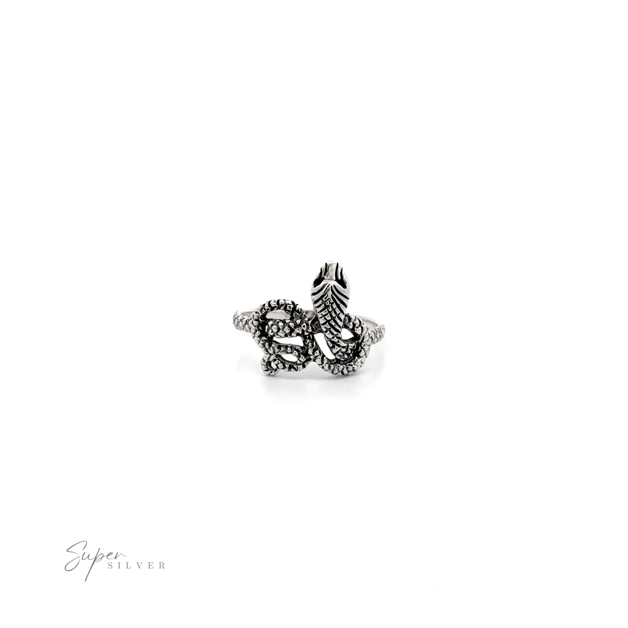 Twisted snake ring with intricate details, displayed on a plain white background and a signature in the bottom right corner.