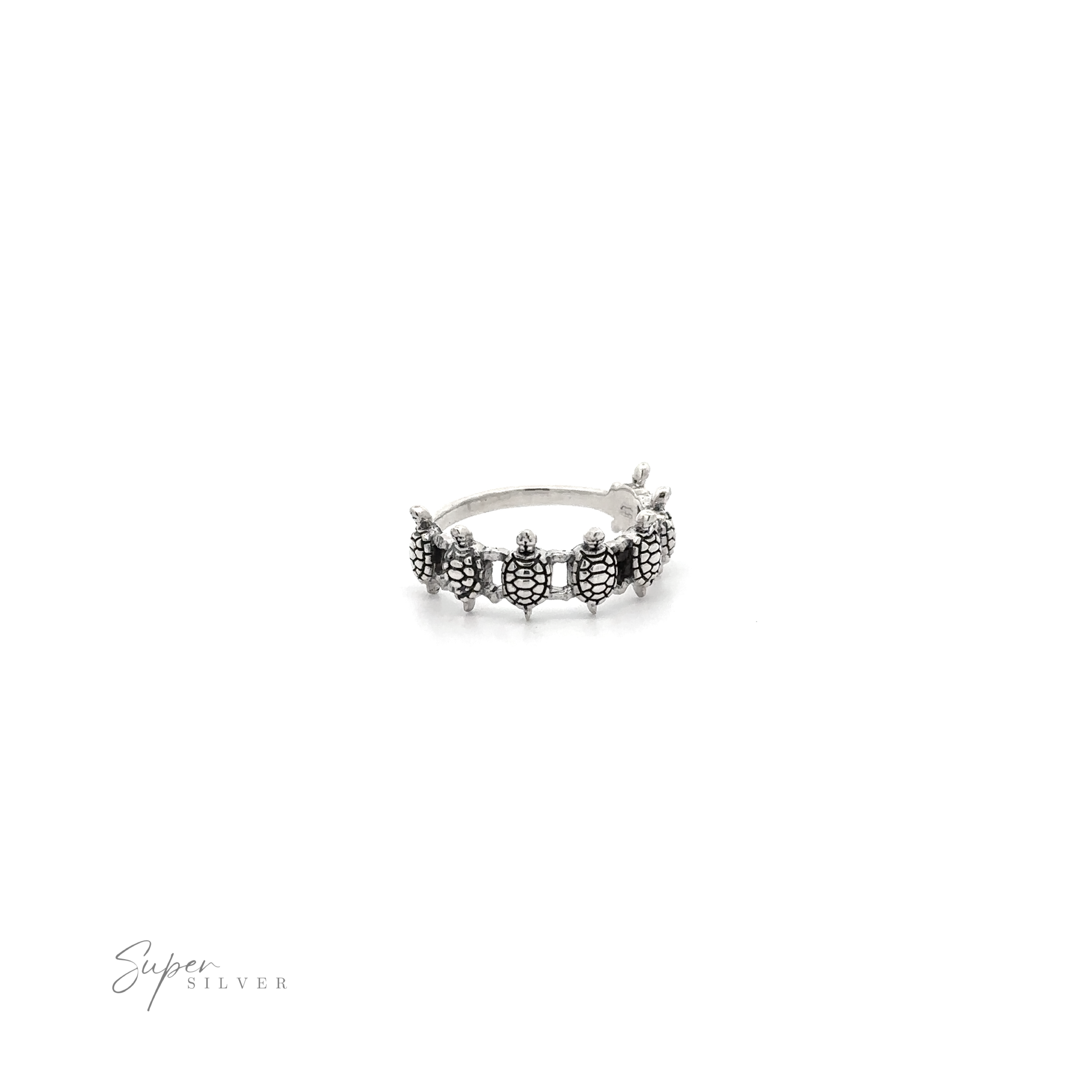 A Turtle Ring featuring three turtles.