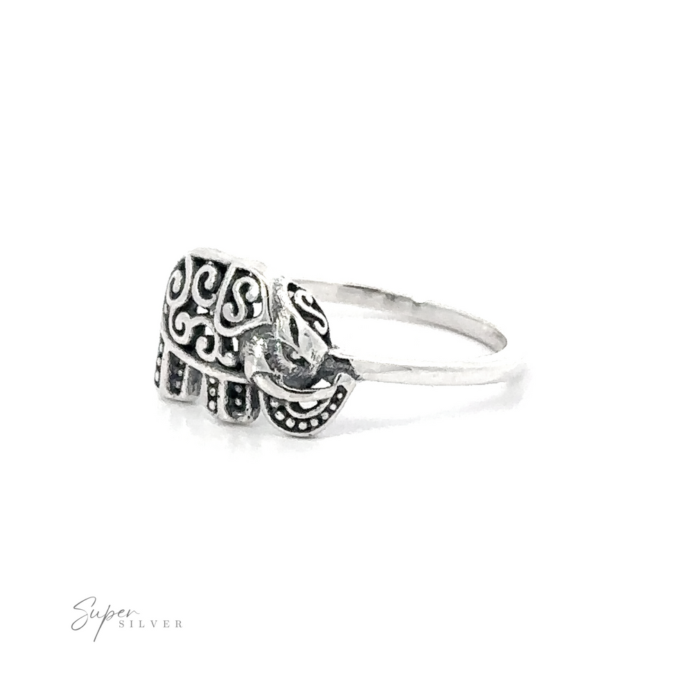 
                  
                    A Filigree Elephant Ring with ornate filigree elephant designs on a white background with the text "super silver" in cursive font.
                  
                