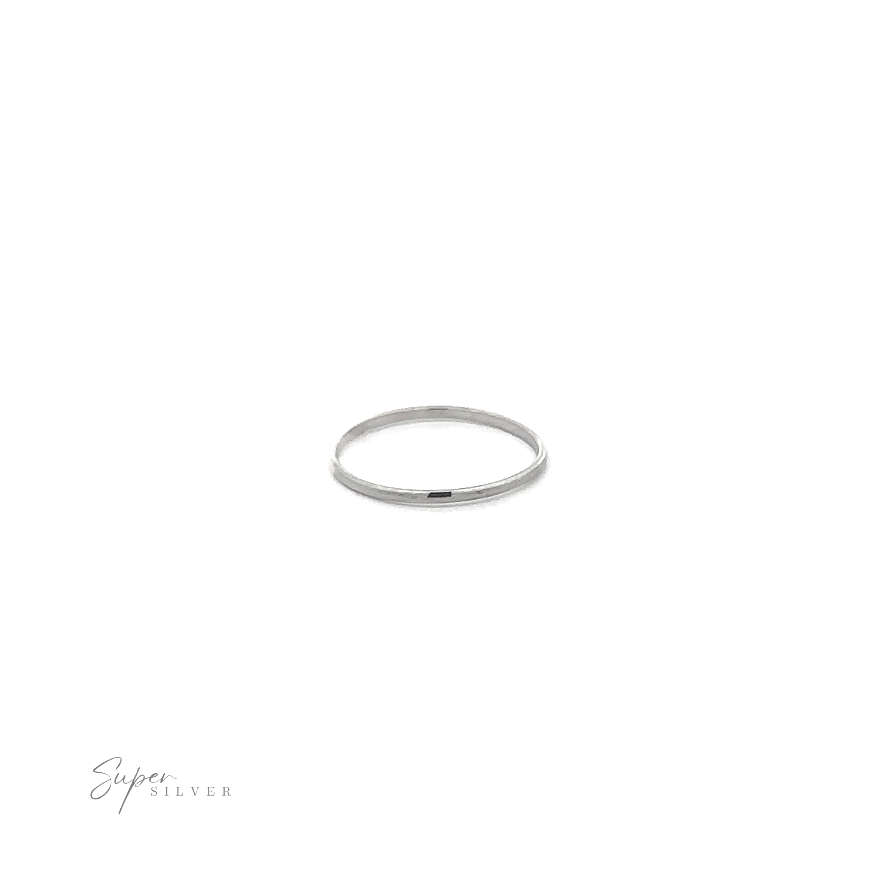 A delicate 1.2mm Plain Bands stacking ring on a minimalist white background.