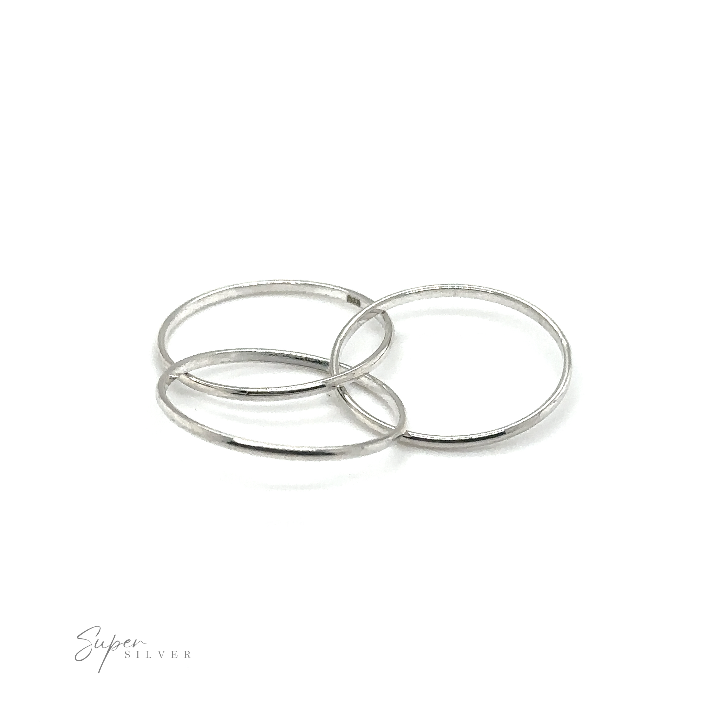 A triple band ring with three Three Ring Rolling Bands, symbolizing devotion, displayed against a pure white background.