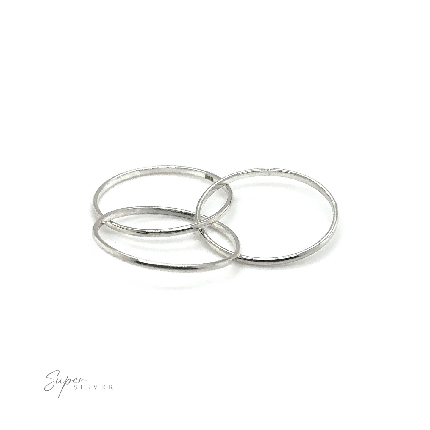 
                  
                    A triple band ring with three Three Ring Rolling Bands, symbolizing devotion, displayed against a pure white background.
                  
                
