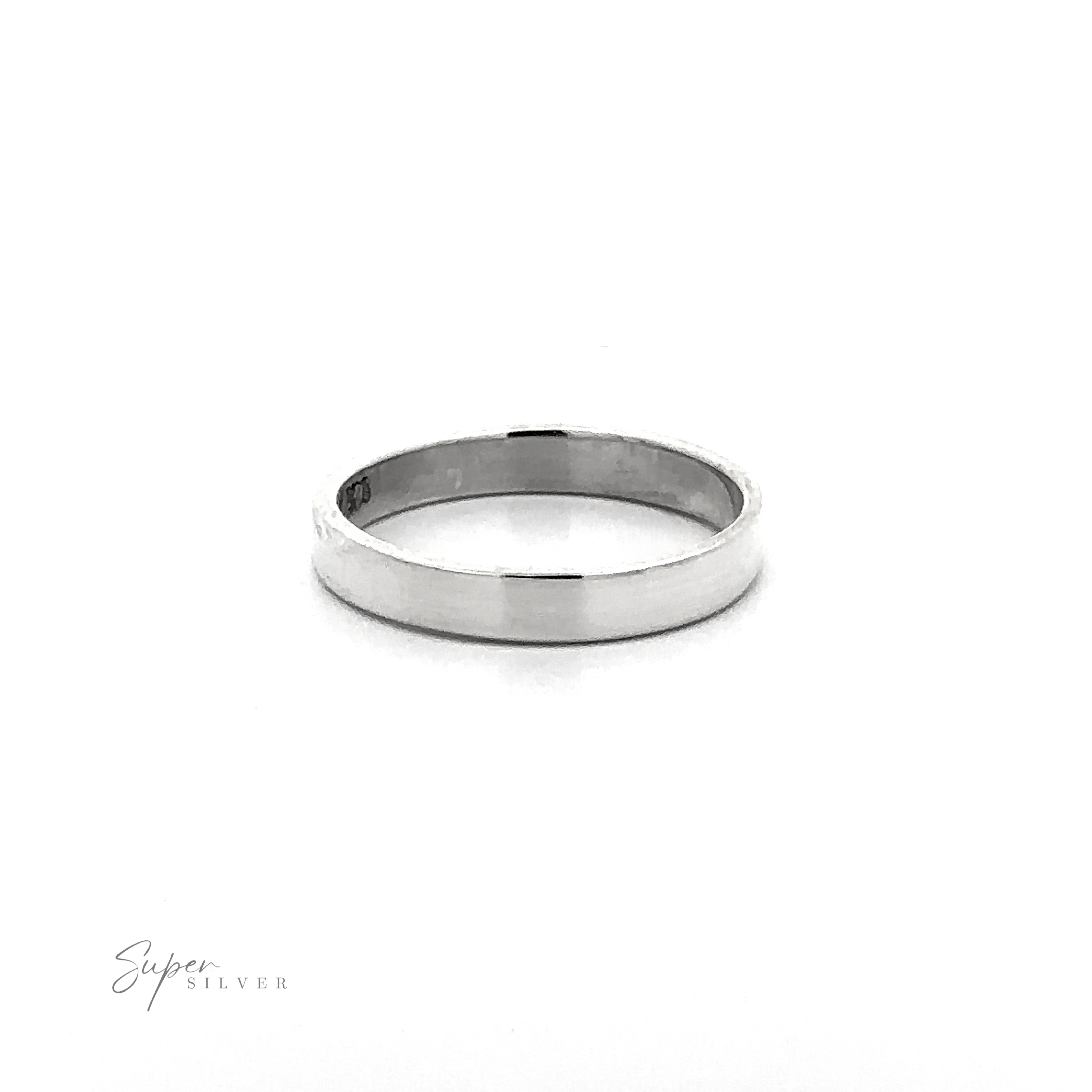 The Minimalist Flat Band Ring, crafted from sterling silver, is shown against a white background in a sleek, minimalist style. The "Super Silver" logo appears in the lower left corner.