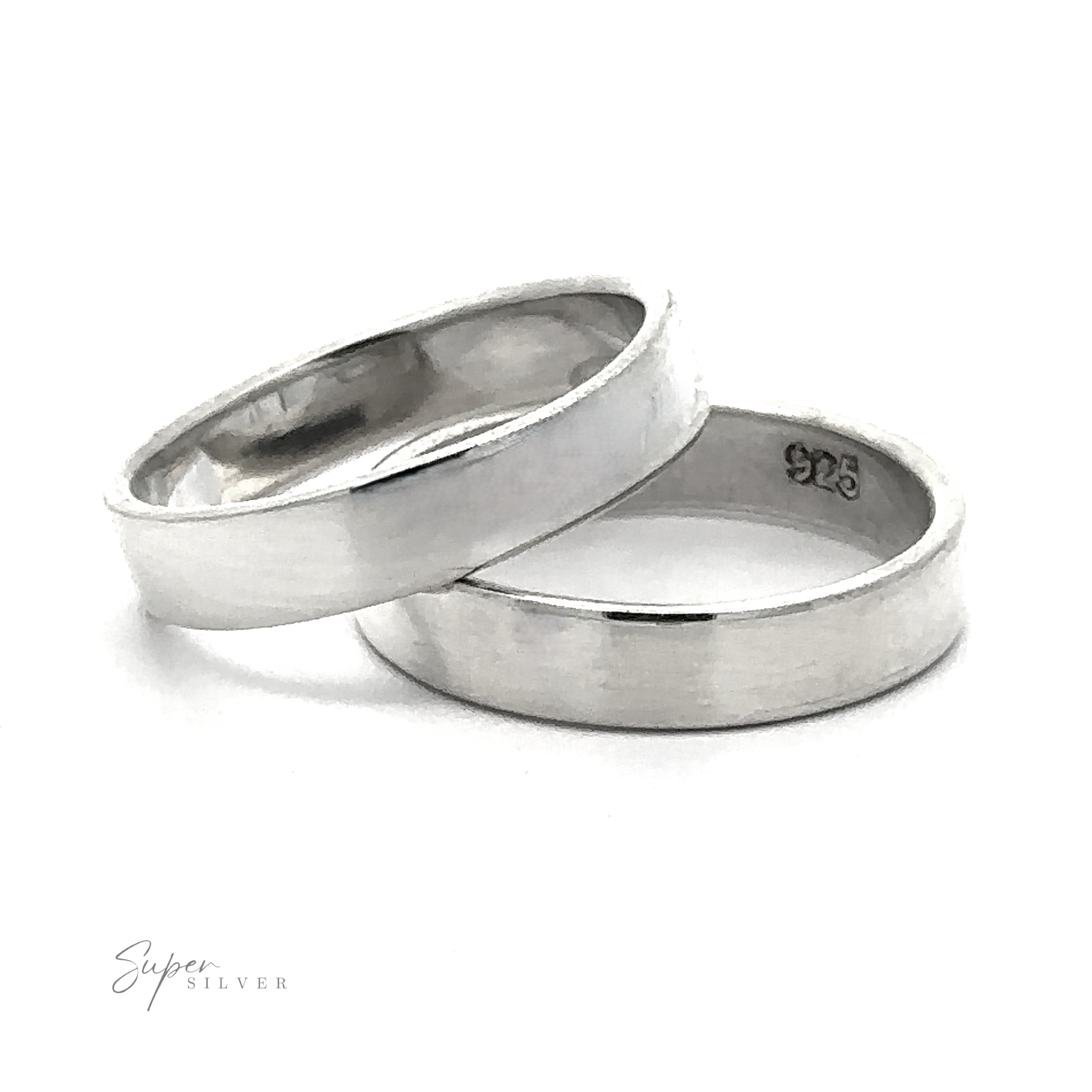 The Minimalist Flat Band Ring is a plain sterling silver band stamped with "925," shown stacked on a white background—the ideal accessory for a minimalist look.