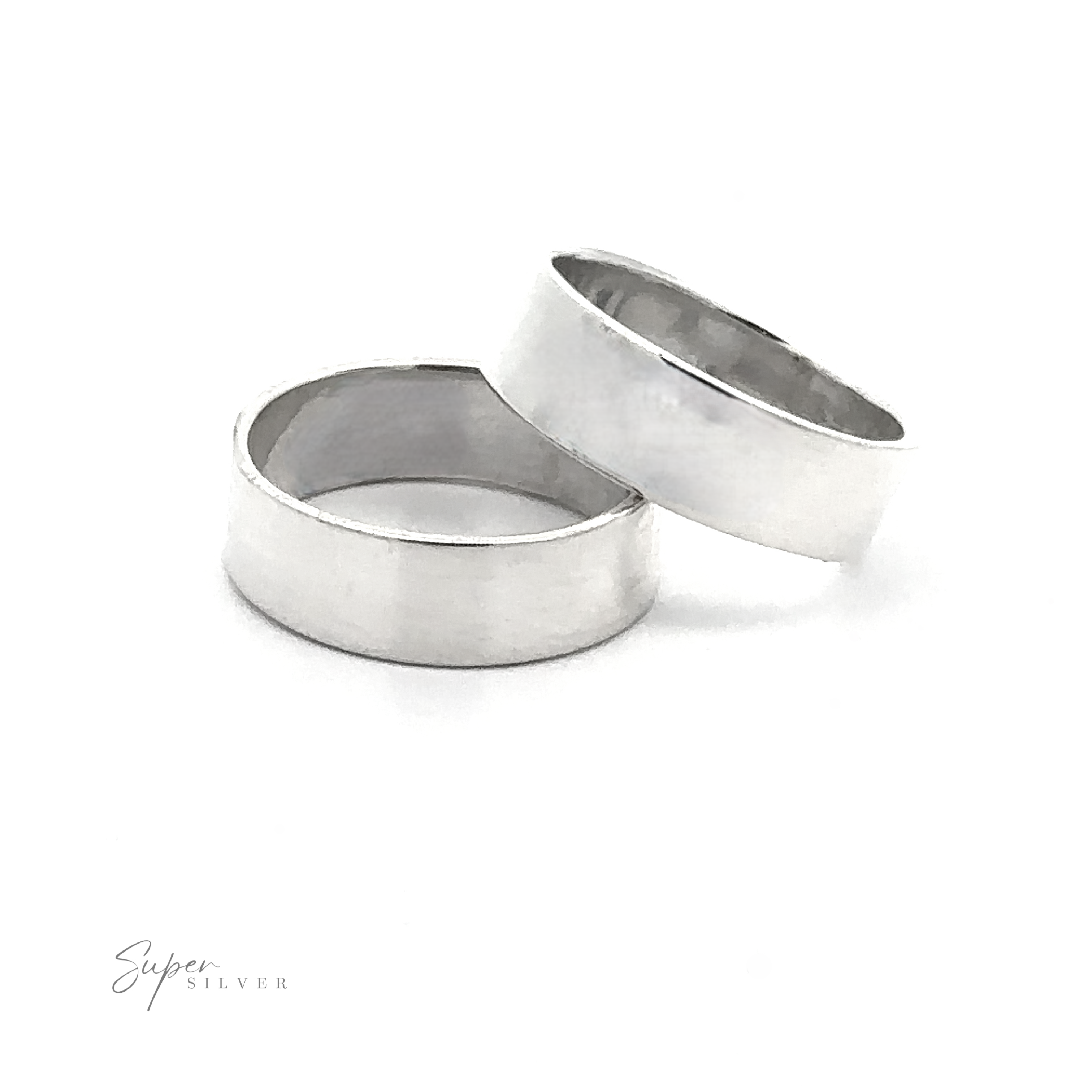 Two Minimal Bold Flat Bands, plain and wide with a polished finish, overlap on a white background. Their simple, elegant sterling silver design makes them ideal as a wedding band set.
