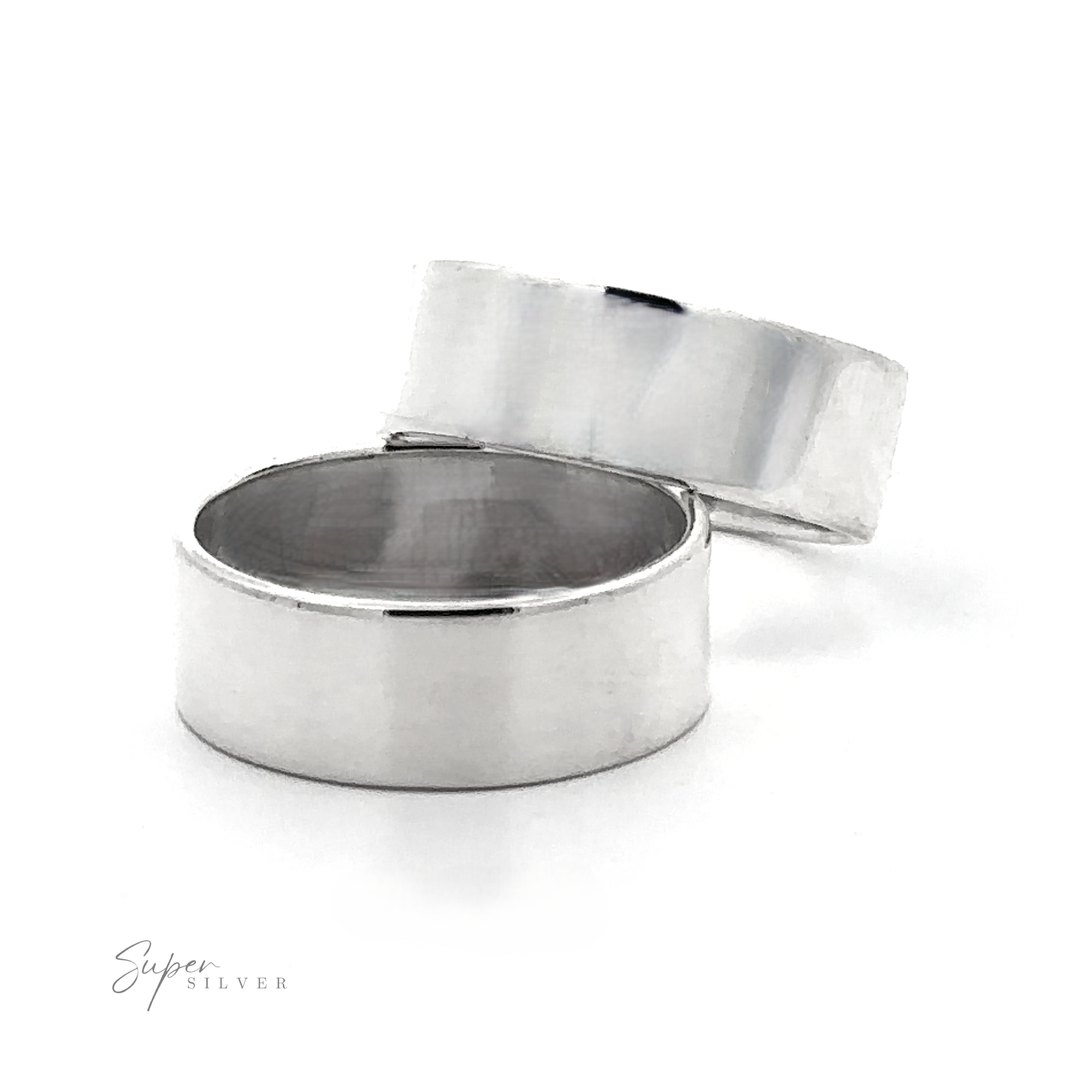 Two Minimal Bold Flat Band rings in sterling silver are displayed on a white background. One flat wedding band lies down while the other leans against it. "Super Silver" is visible in the bottom left corner.