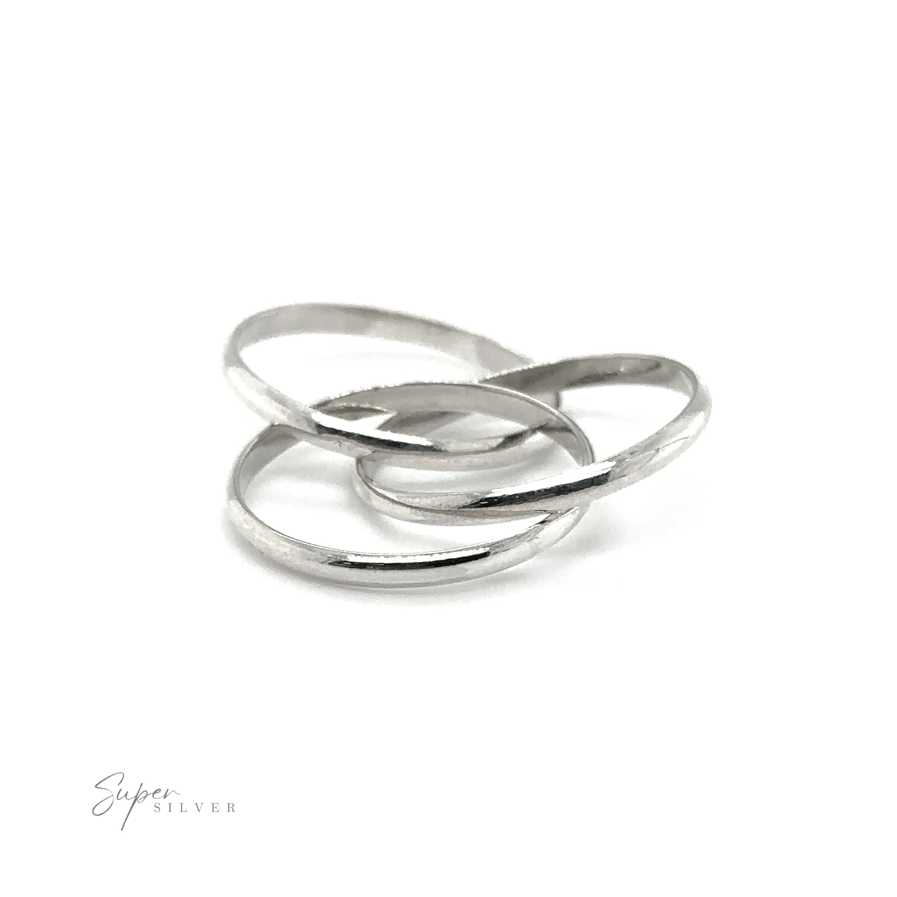 A Three Ring Rolling Bands showcasing symbolism and devotion, gleaming in silver on a pristine white background.