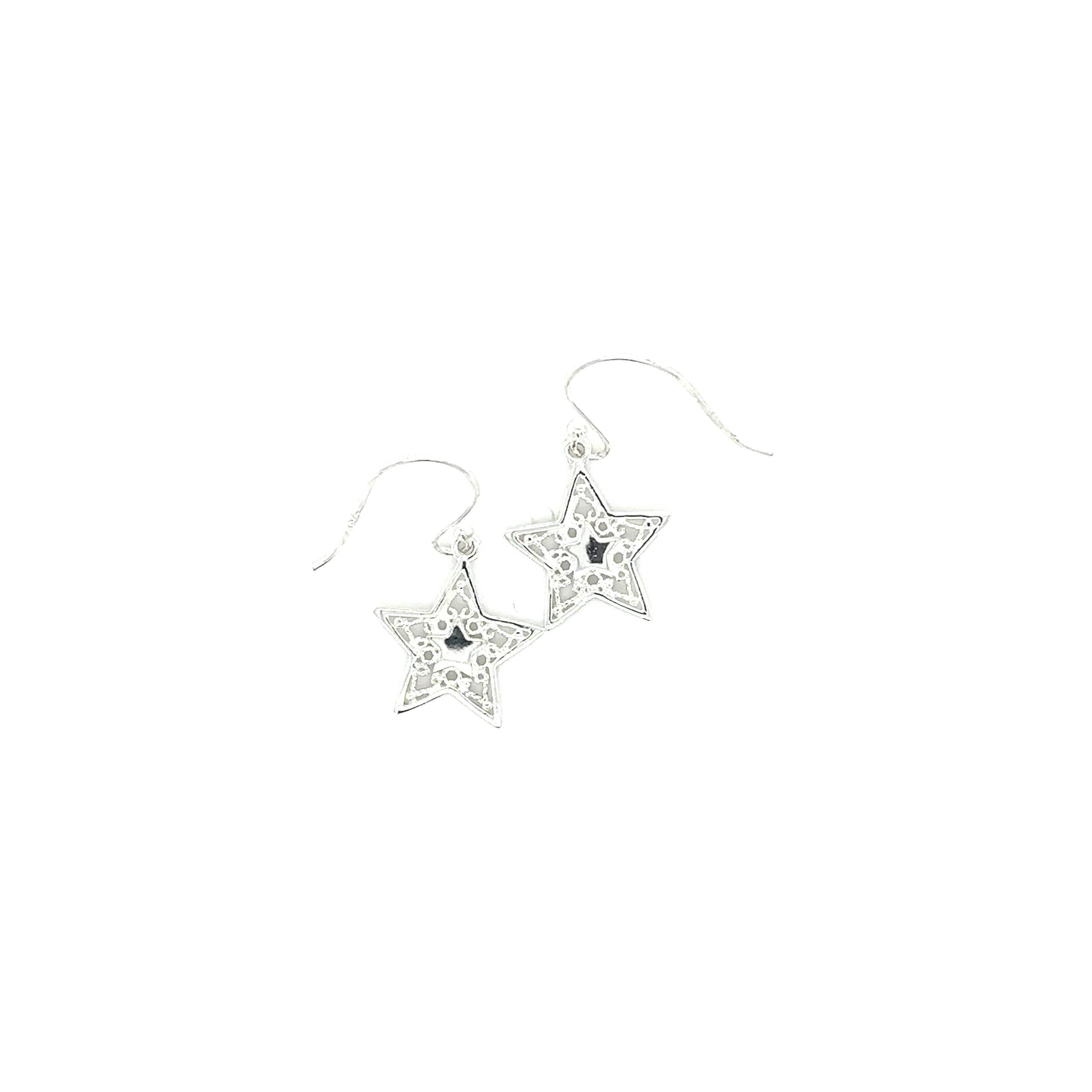 A pair of Open Star Drop Earrings with Rope Design from Super Silver on a white background.