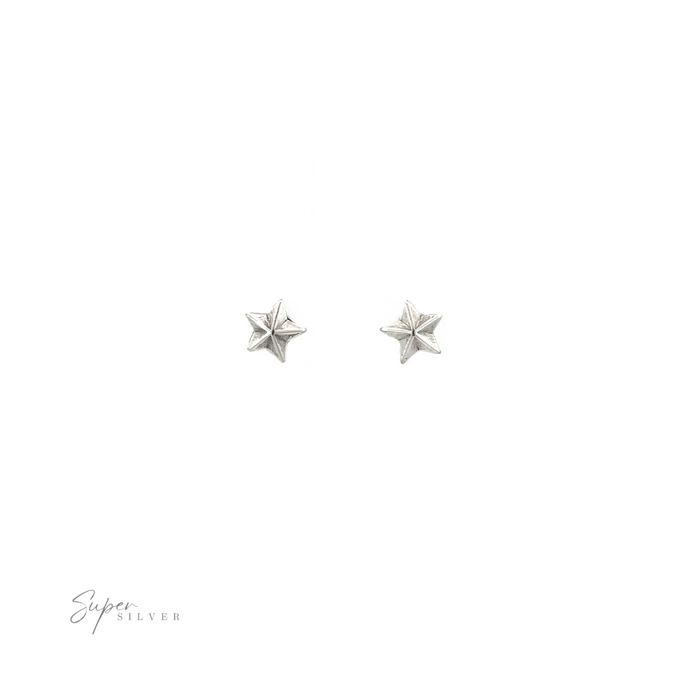 
                  
                    A pair of twinkling Star Studs on a white background.
                  
                