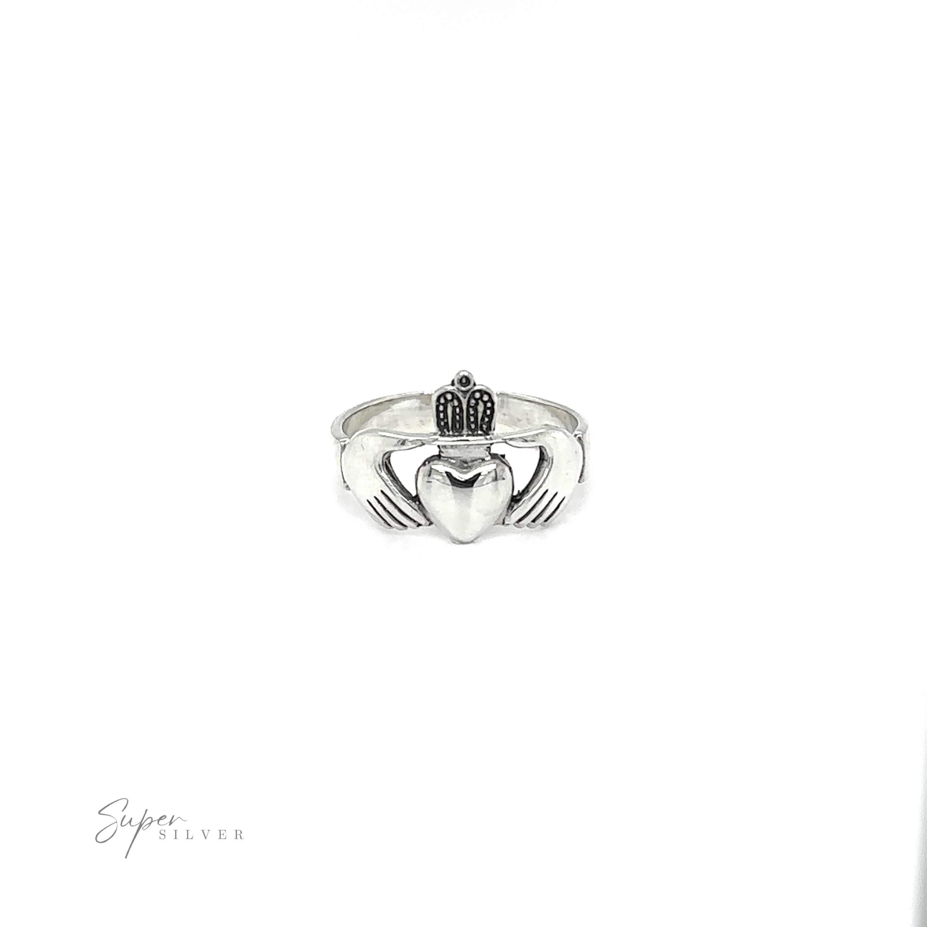 A thick Claddagh ring symbolizing love and loyalty, with a heart on it.