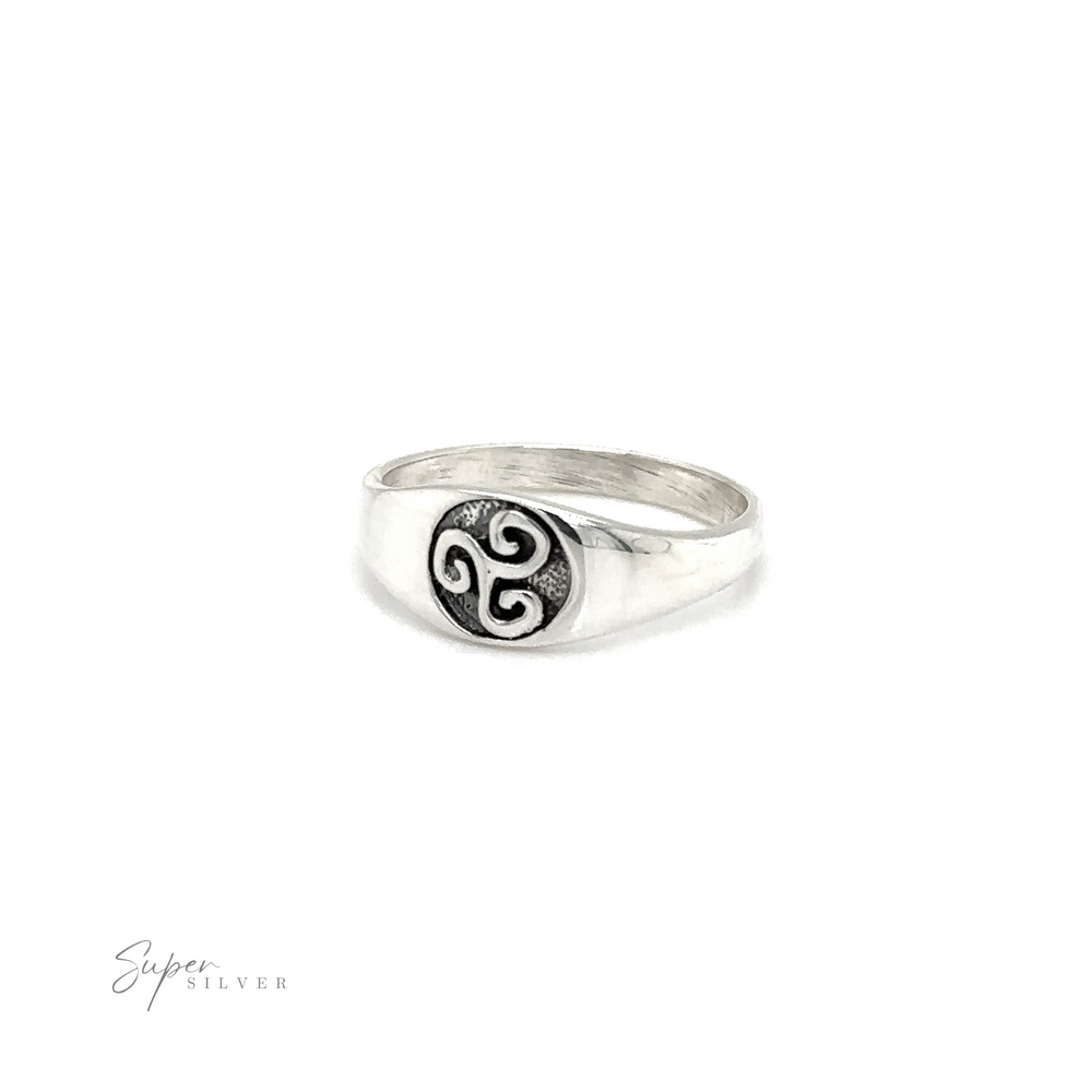 
                  
                    A mens Celtic Spiral Signet Ring with a black and white design.
                  
                